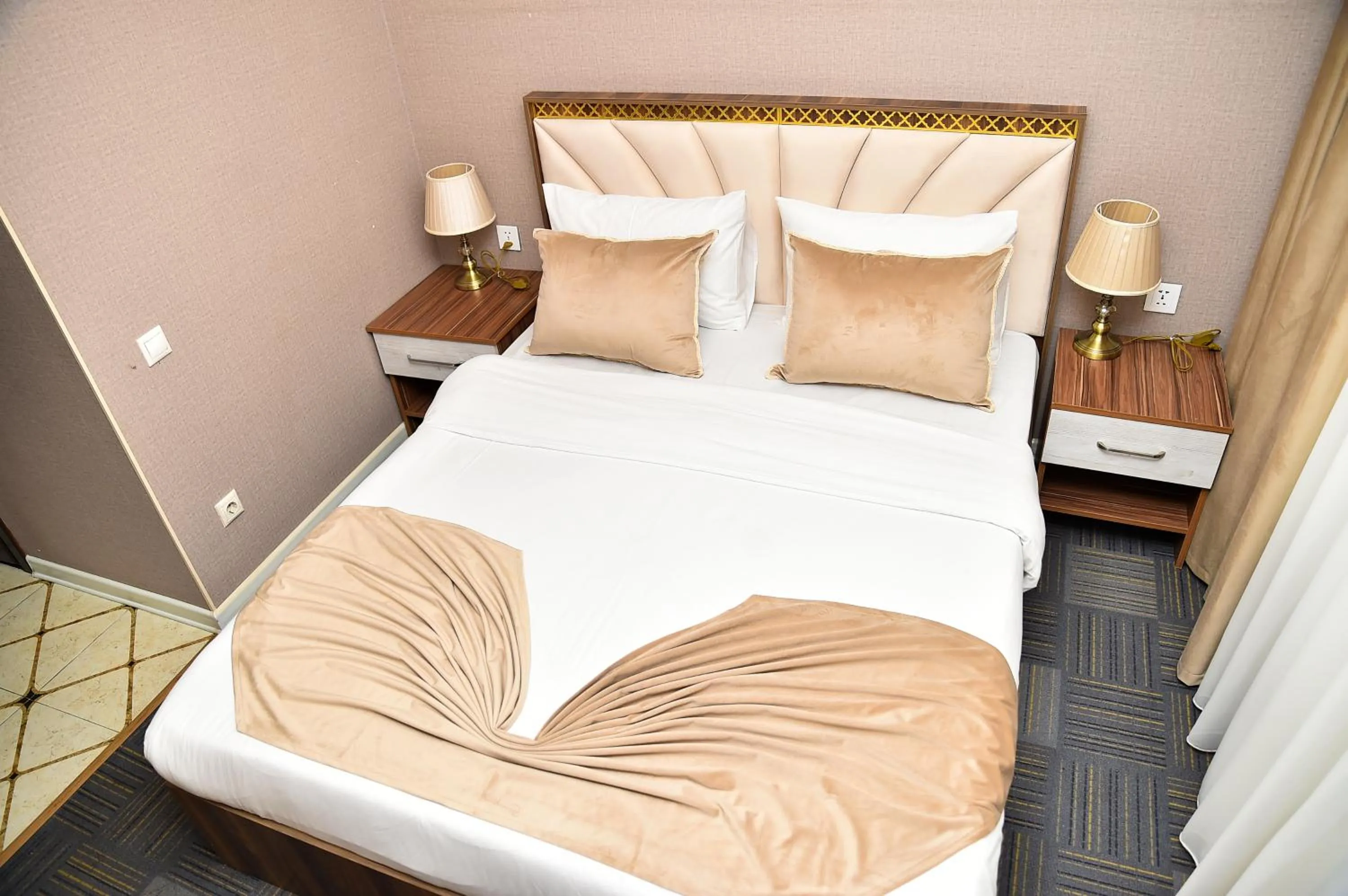 Bed in Boulevard Rigs Boutique Hotel