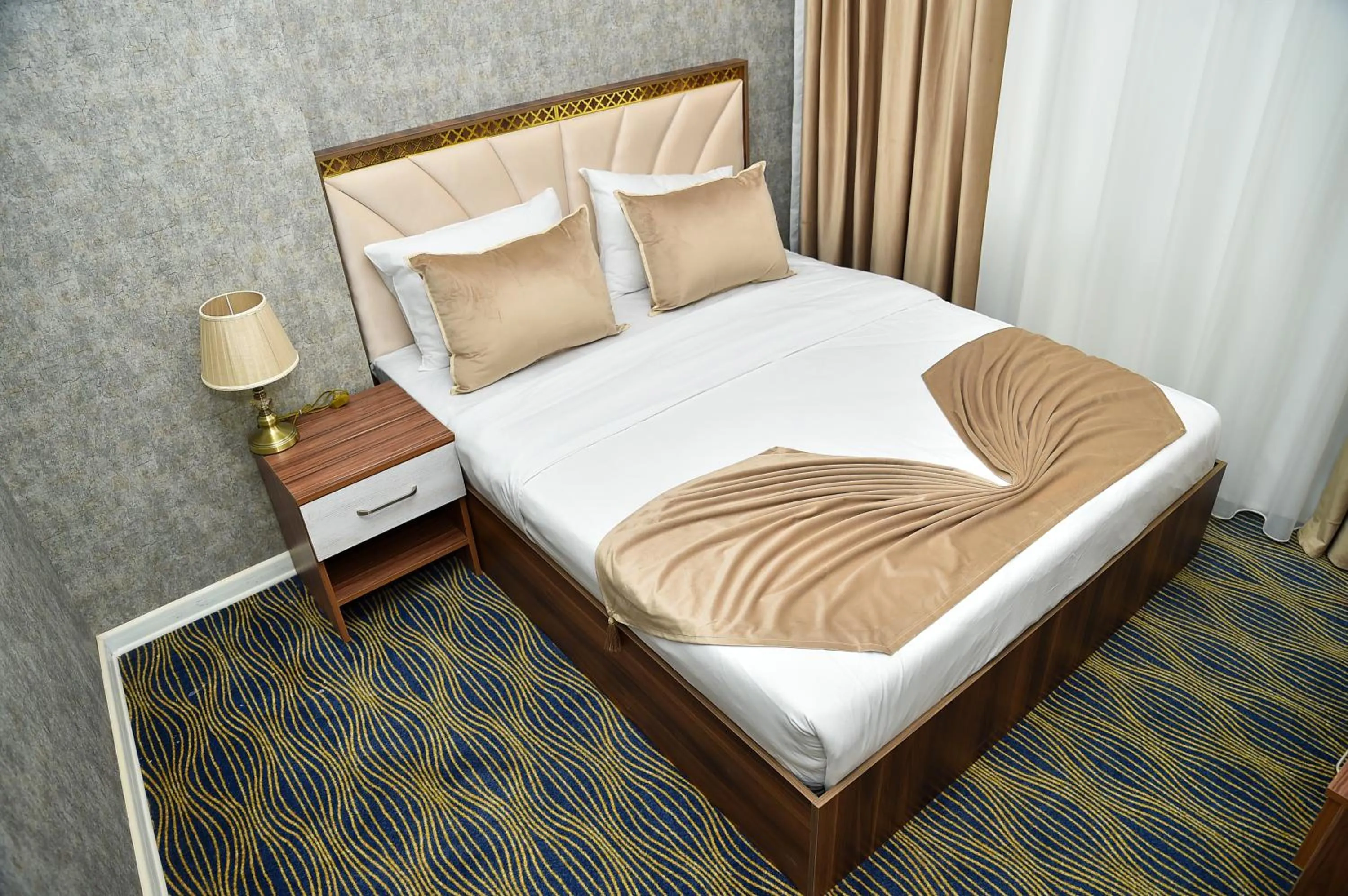Bed in Boulevard Rigs Boutique Hotel