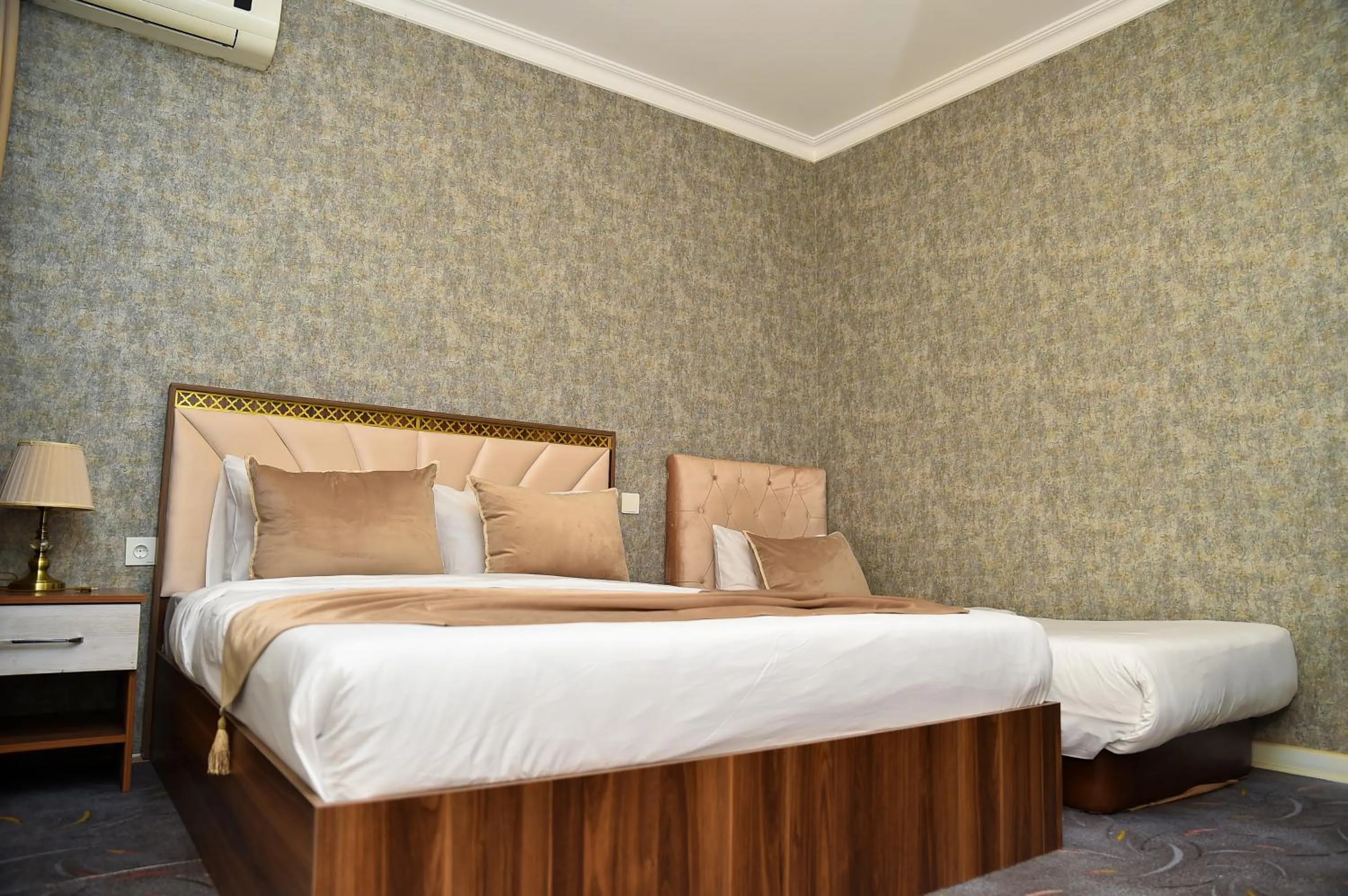 Bed in Boulevard Rigs Boutique Hotel