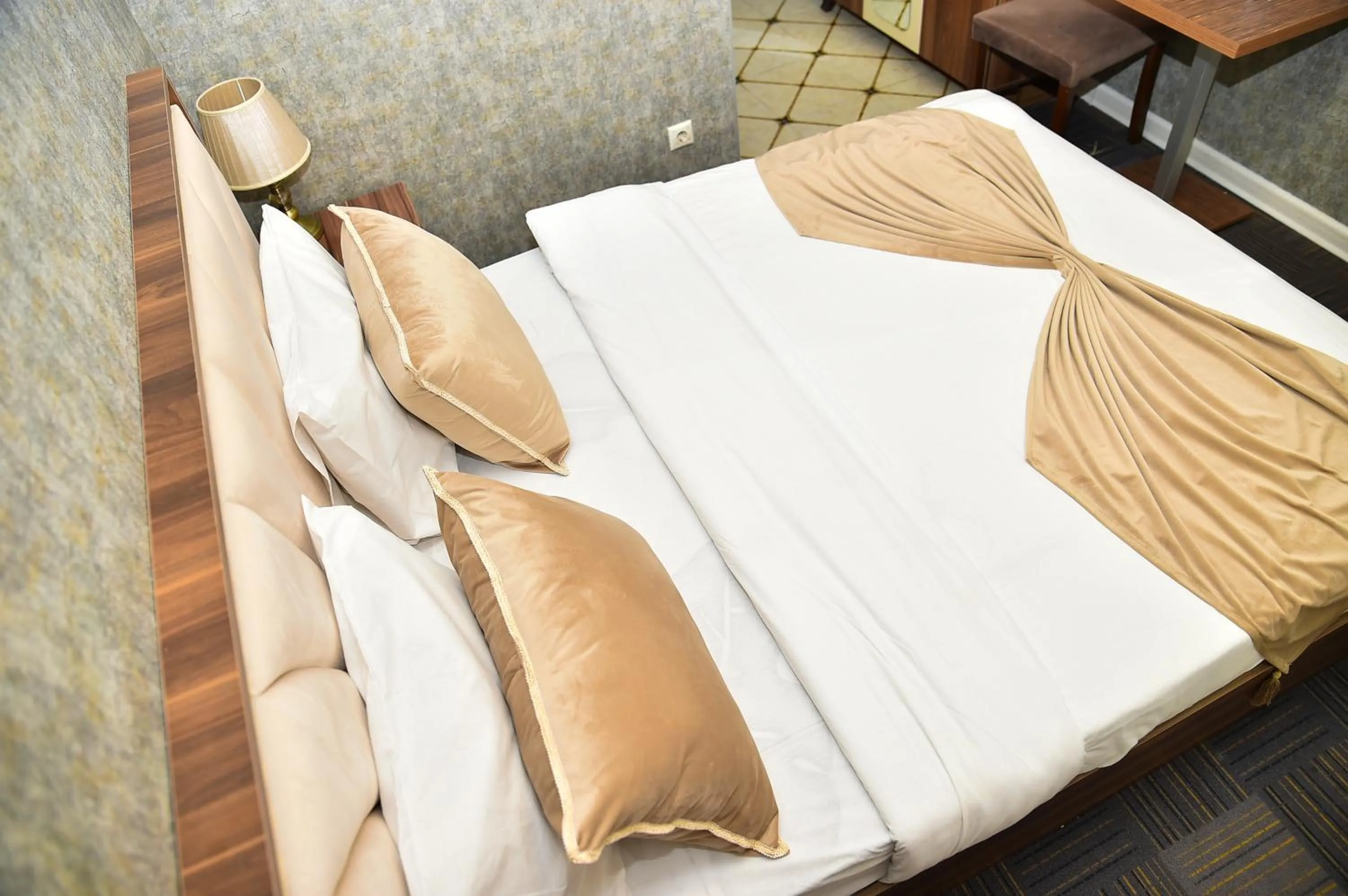 Bed in Boulevard Rigs Boutique Hotel