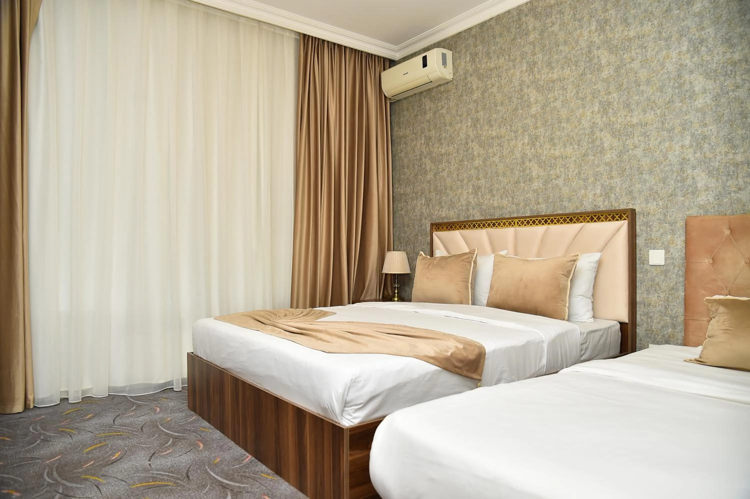 Bed in Boulevard Rigs Boutique Hotel