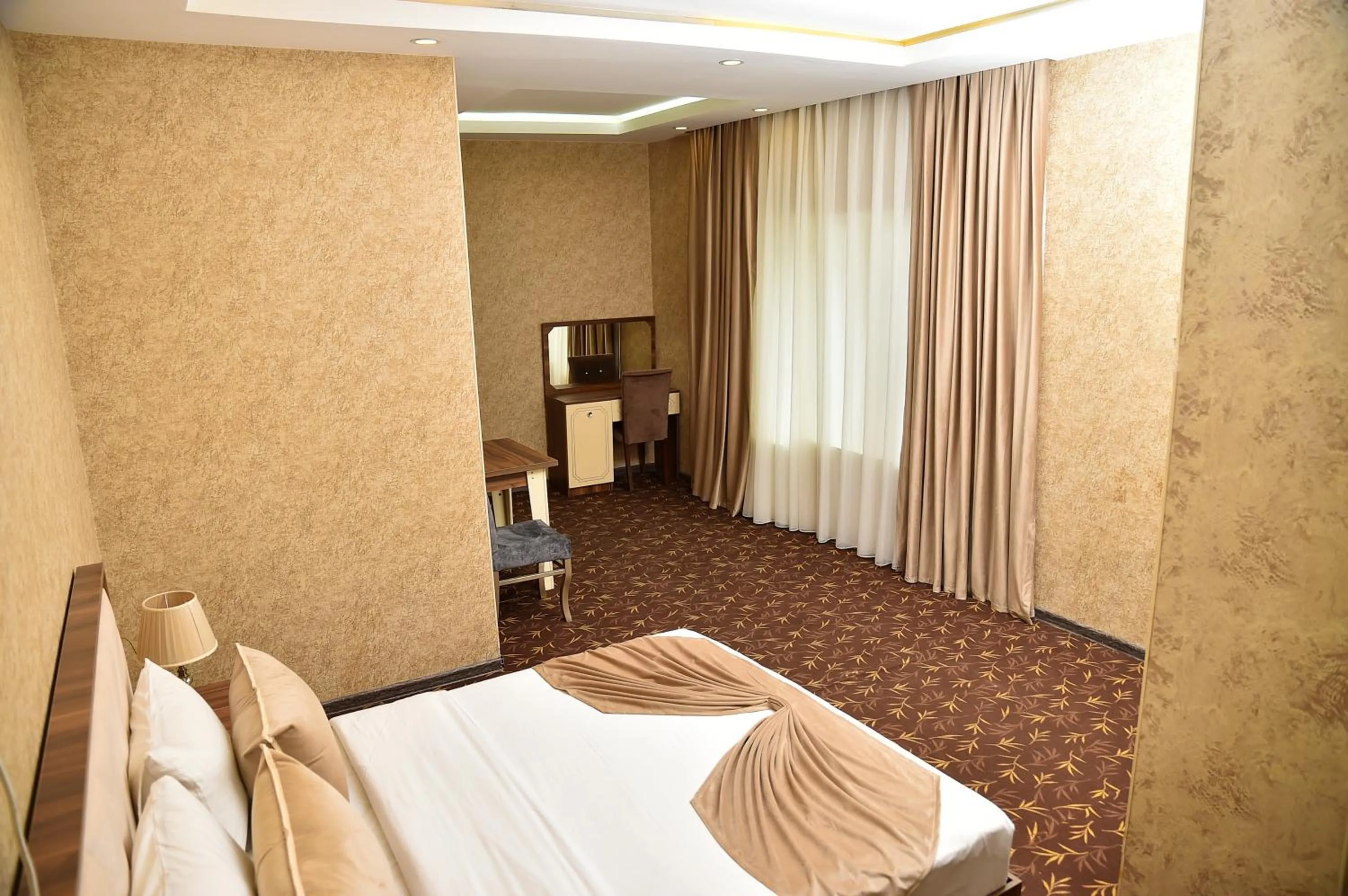 Bed in Boulevard Rigs Boutique Hotel