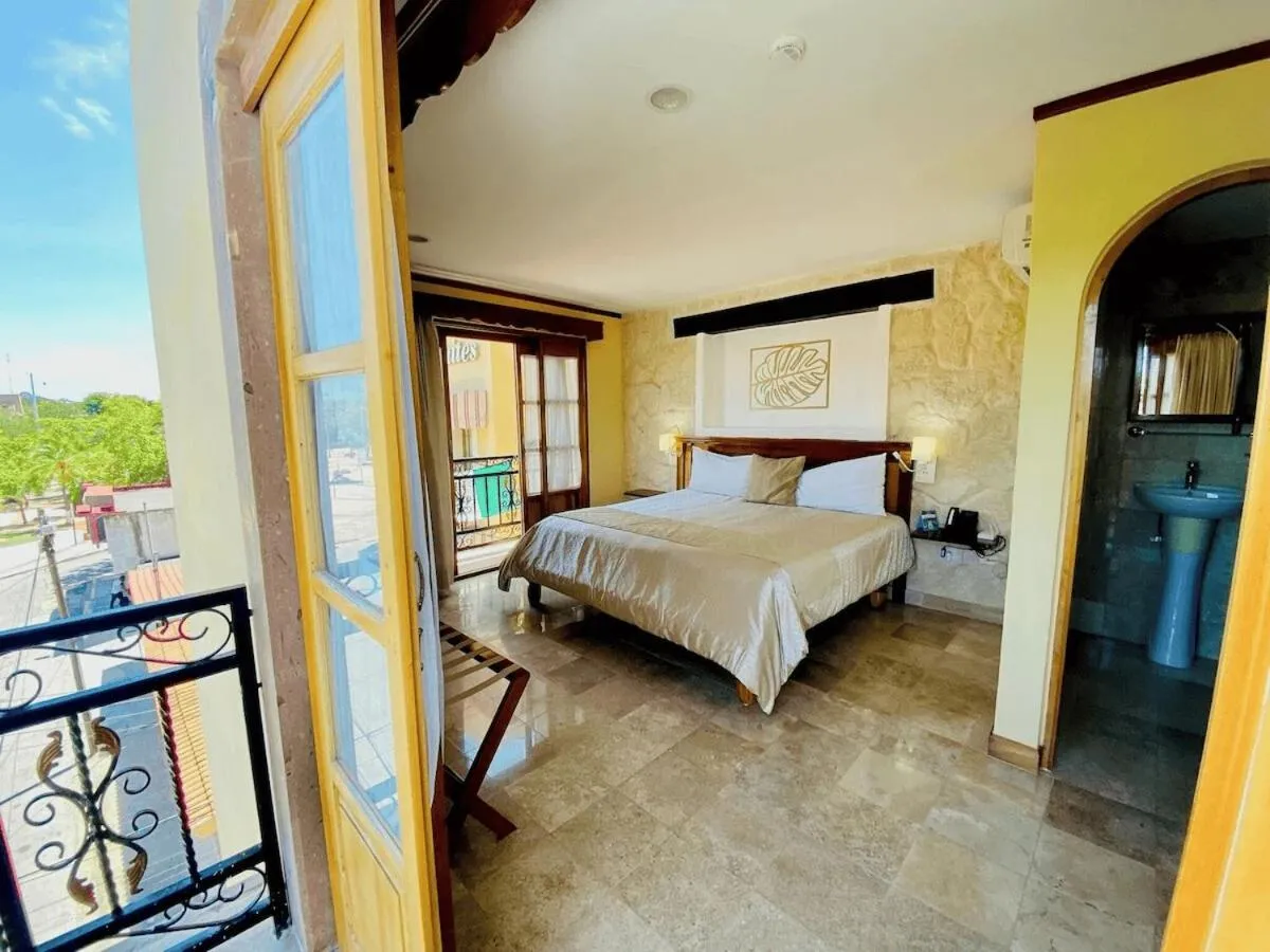 Bed in Cancun International Suites