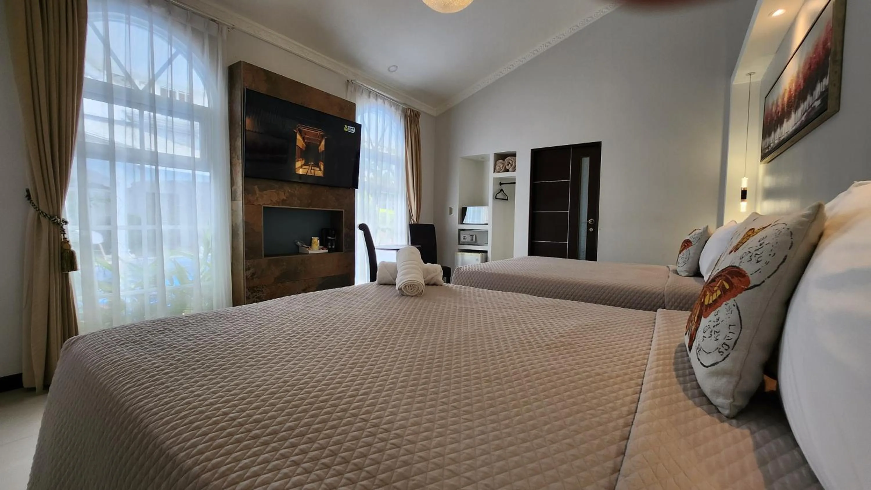 Bed in Alameda Cariari Boutique Hotel