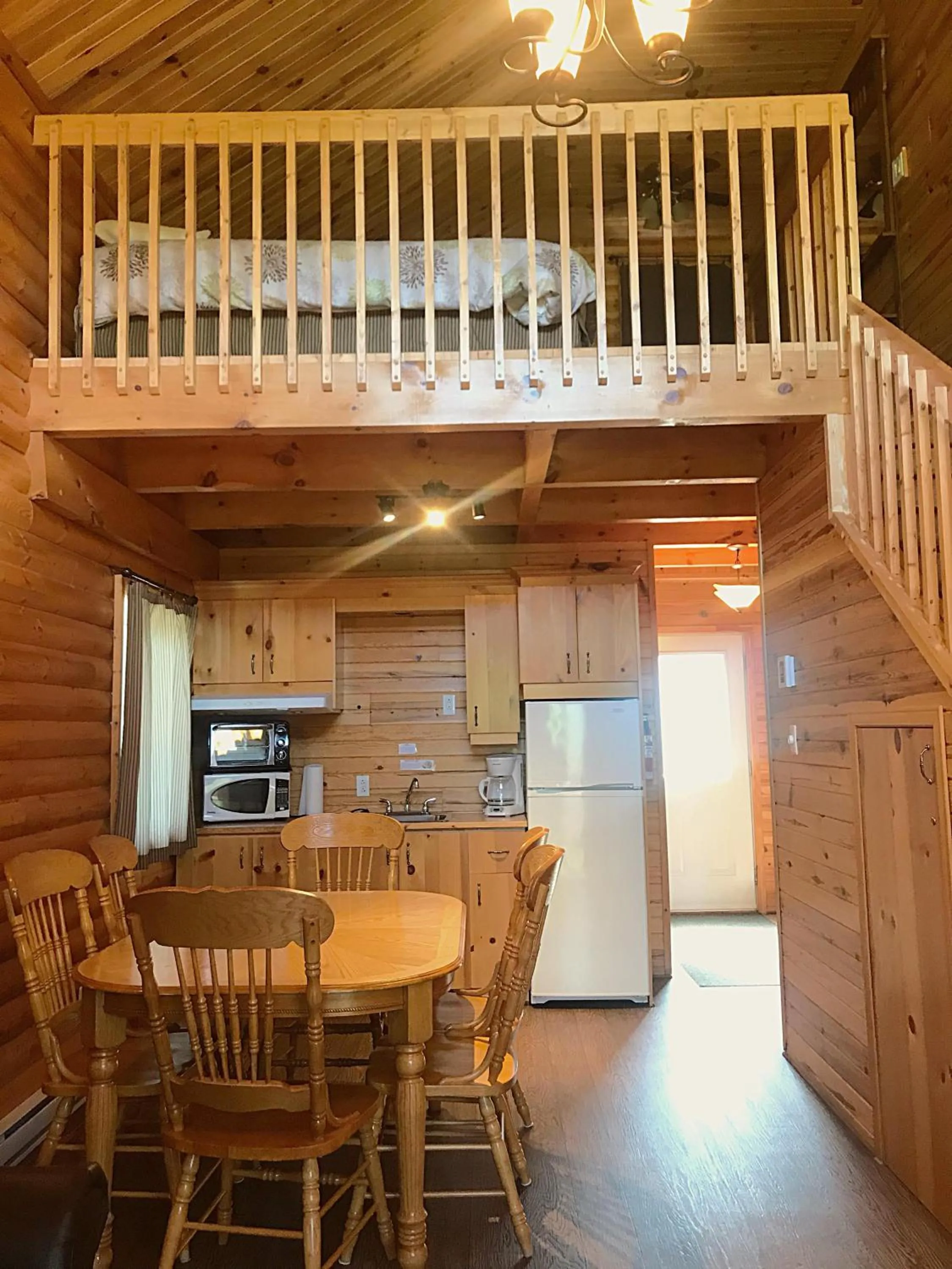 Kitchen or kitchenette in Chalets et Spa Lac Saint-Jean
