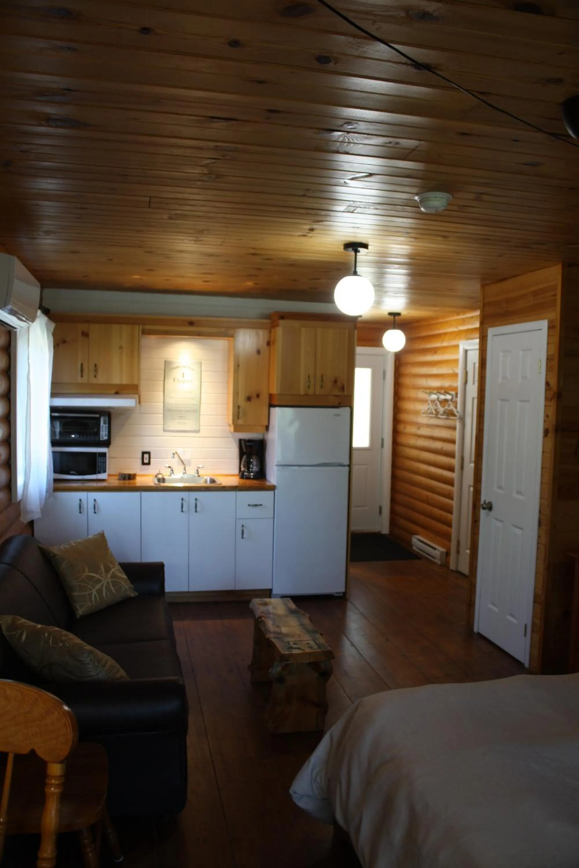 Kitchen or kitchenette in Chalets et Spa Lac Saint-Jean