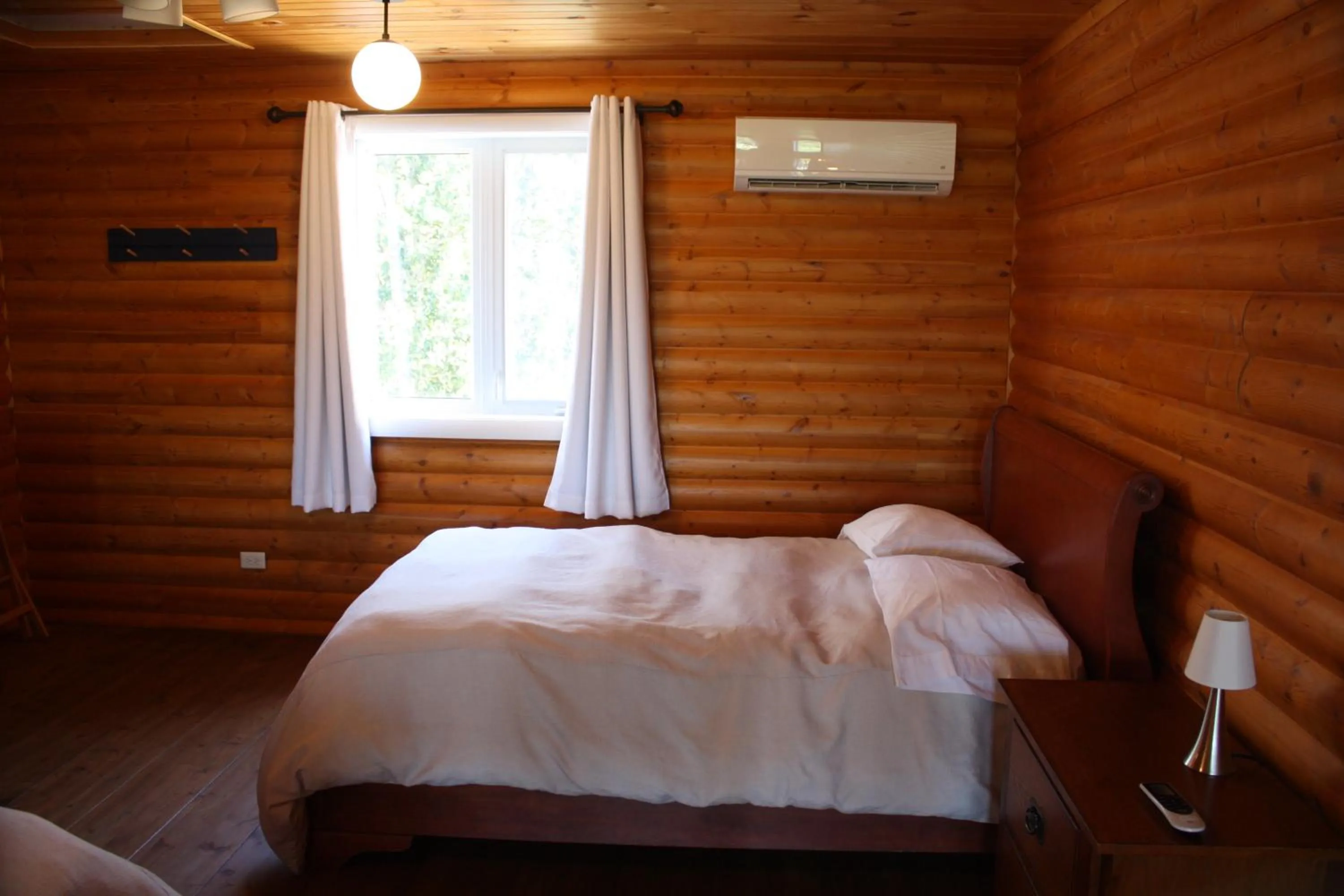 Bedroom, Bed in Chalets et Spa Lac Saint-Jean
