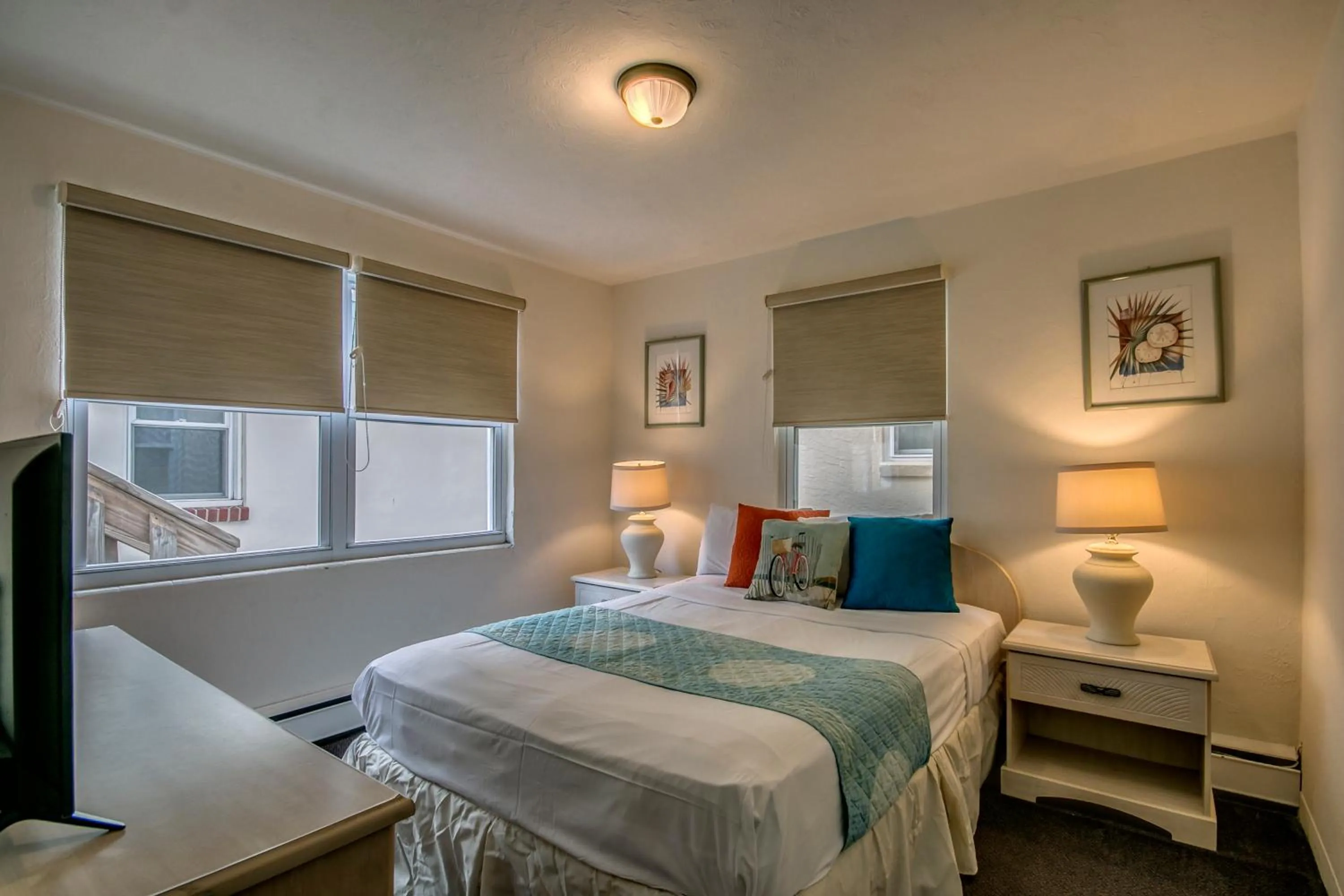 Bed in Daytona Inn and Suites