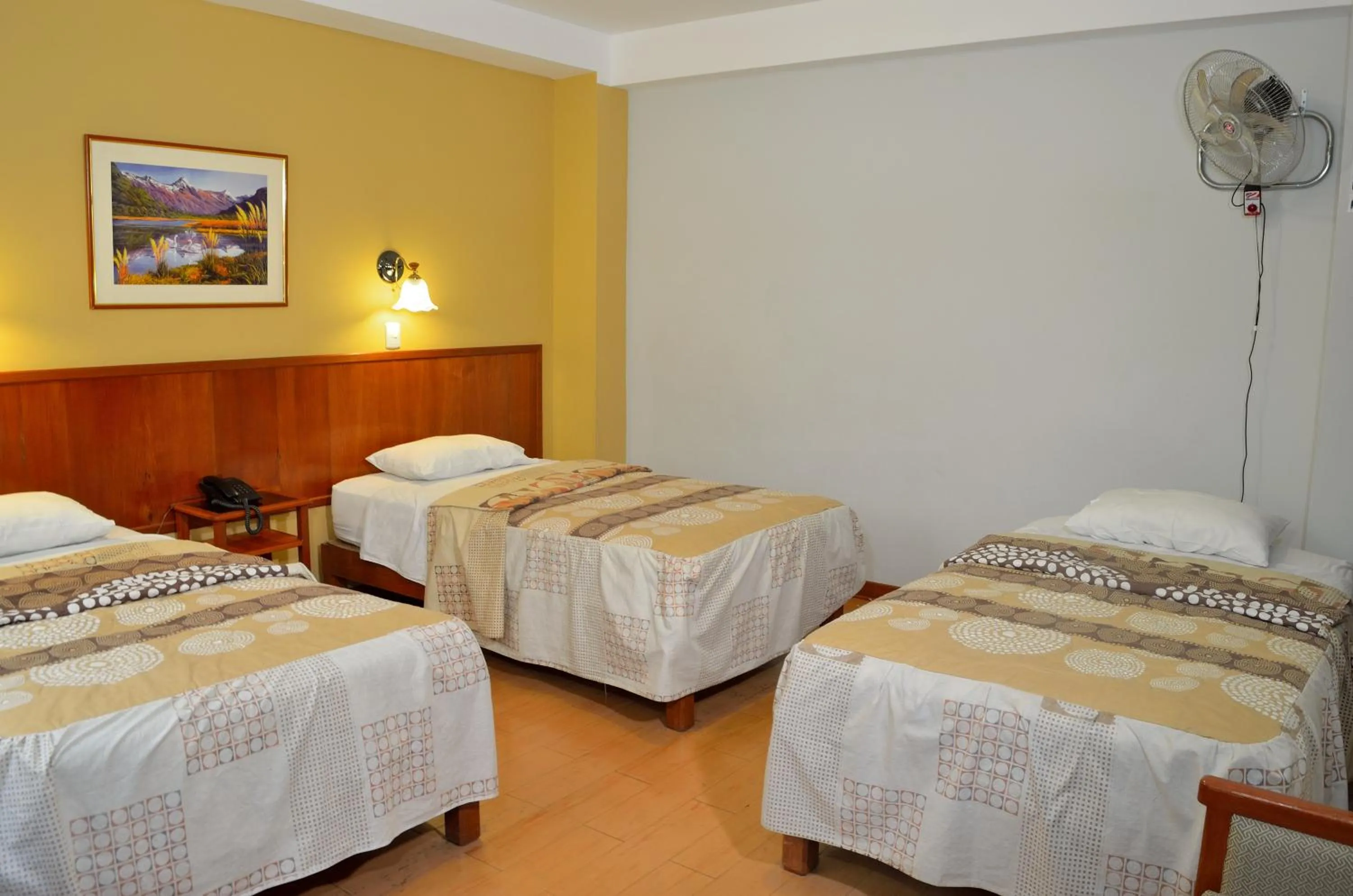 Bed in Primavera Plaza Hotel