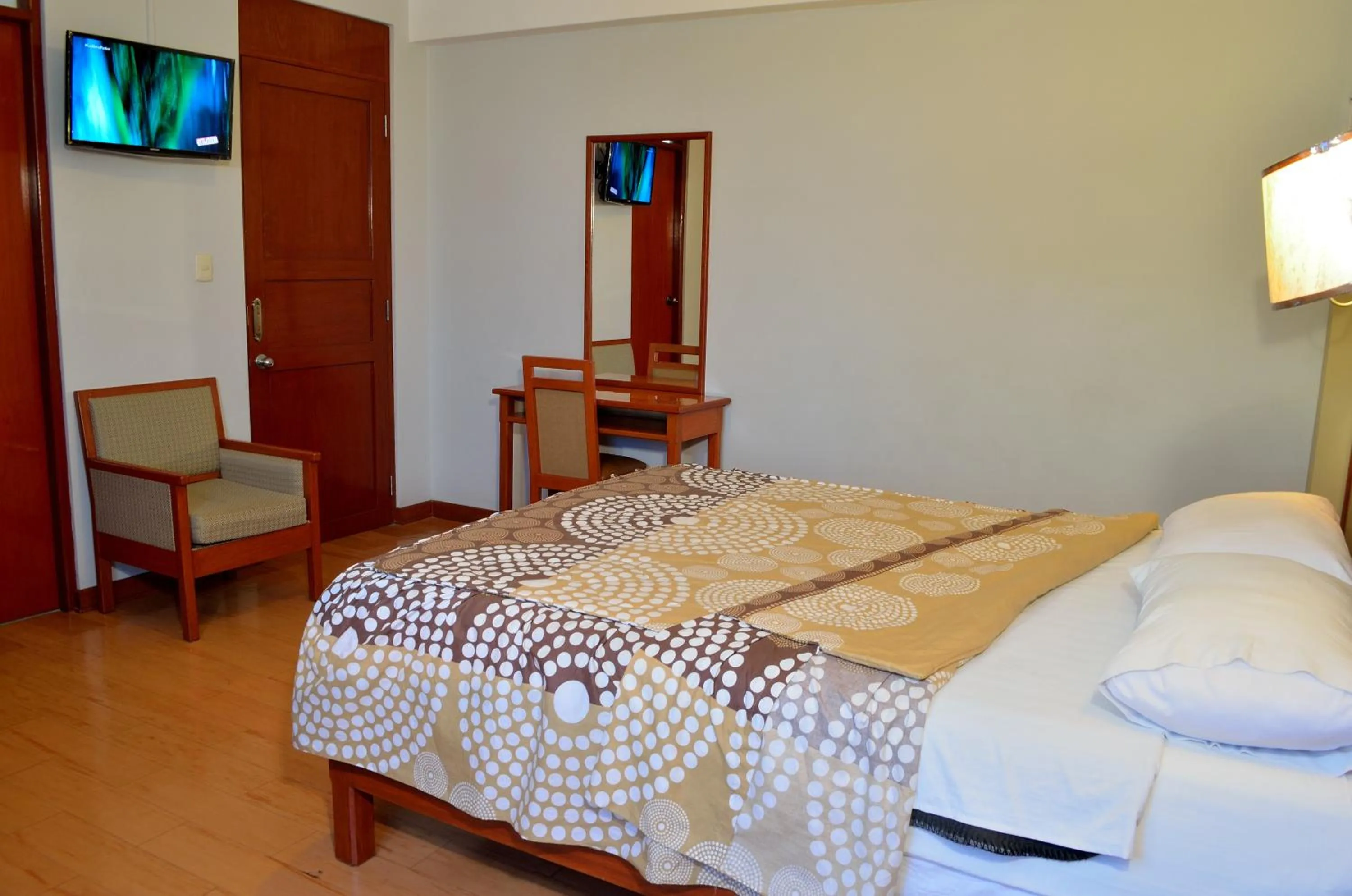 Bed in Primavera Plaza Hotel