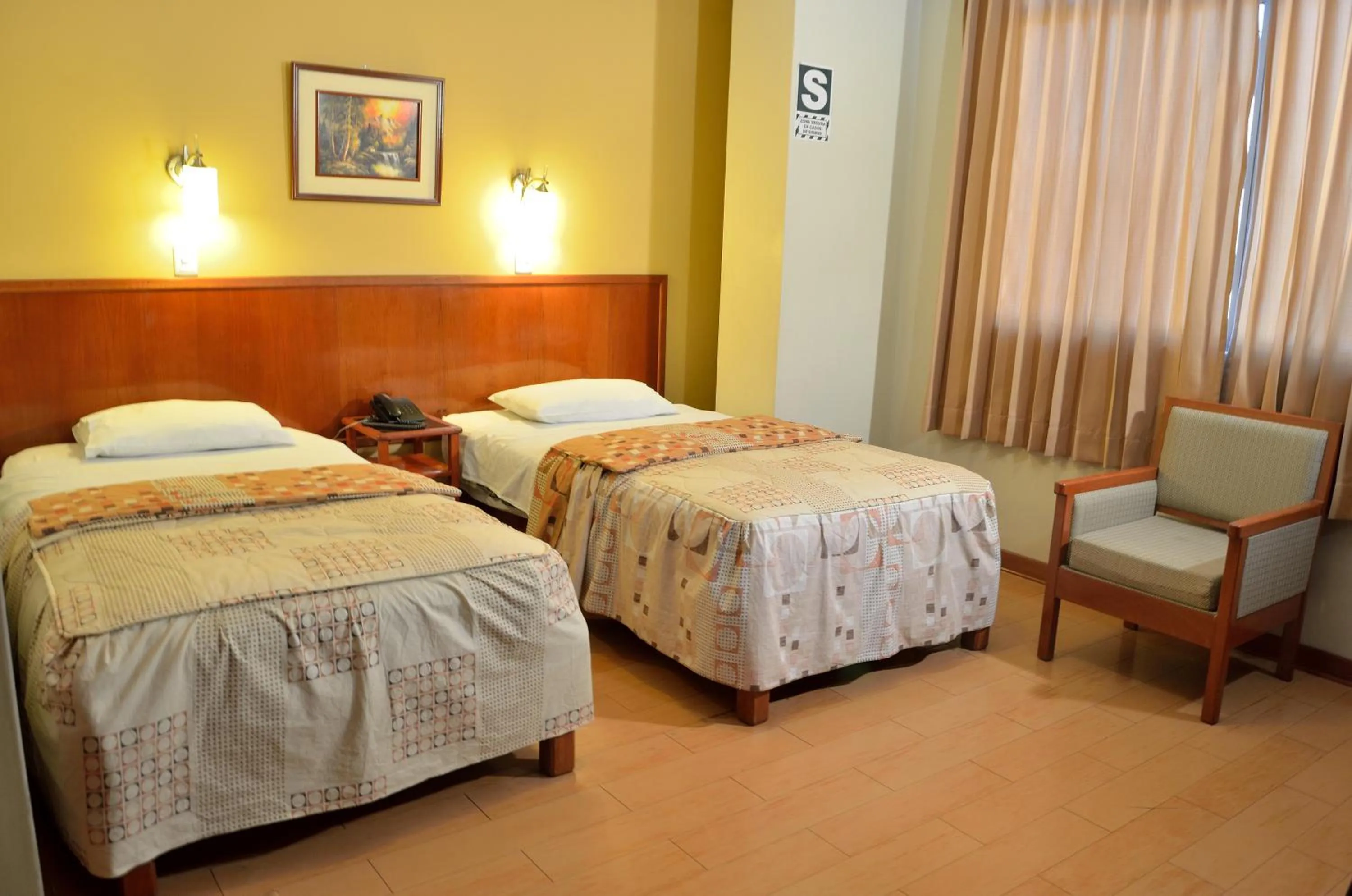 Bed in Primavera Plaza Hotel