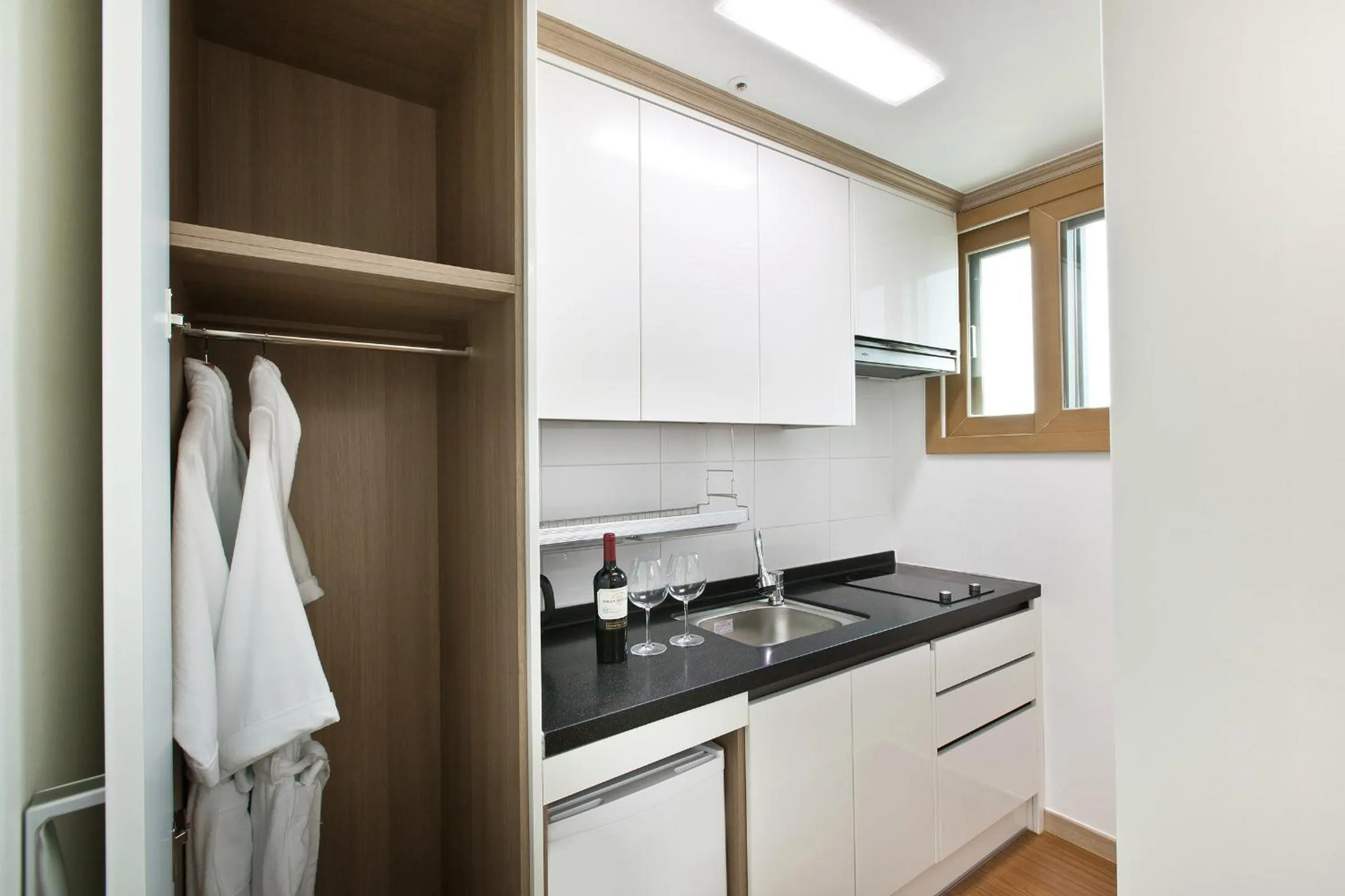 Kitchen or kitchenette in Familia Hotel