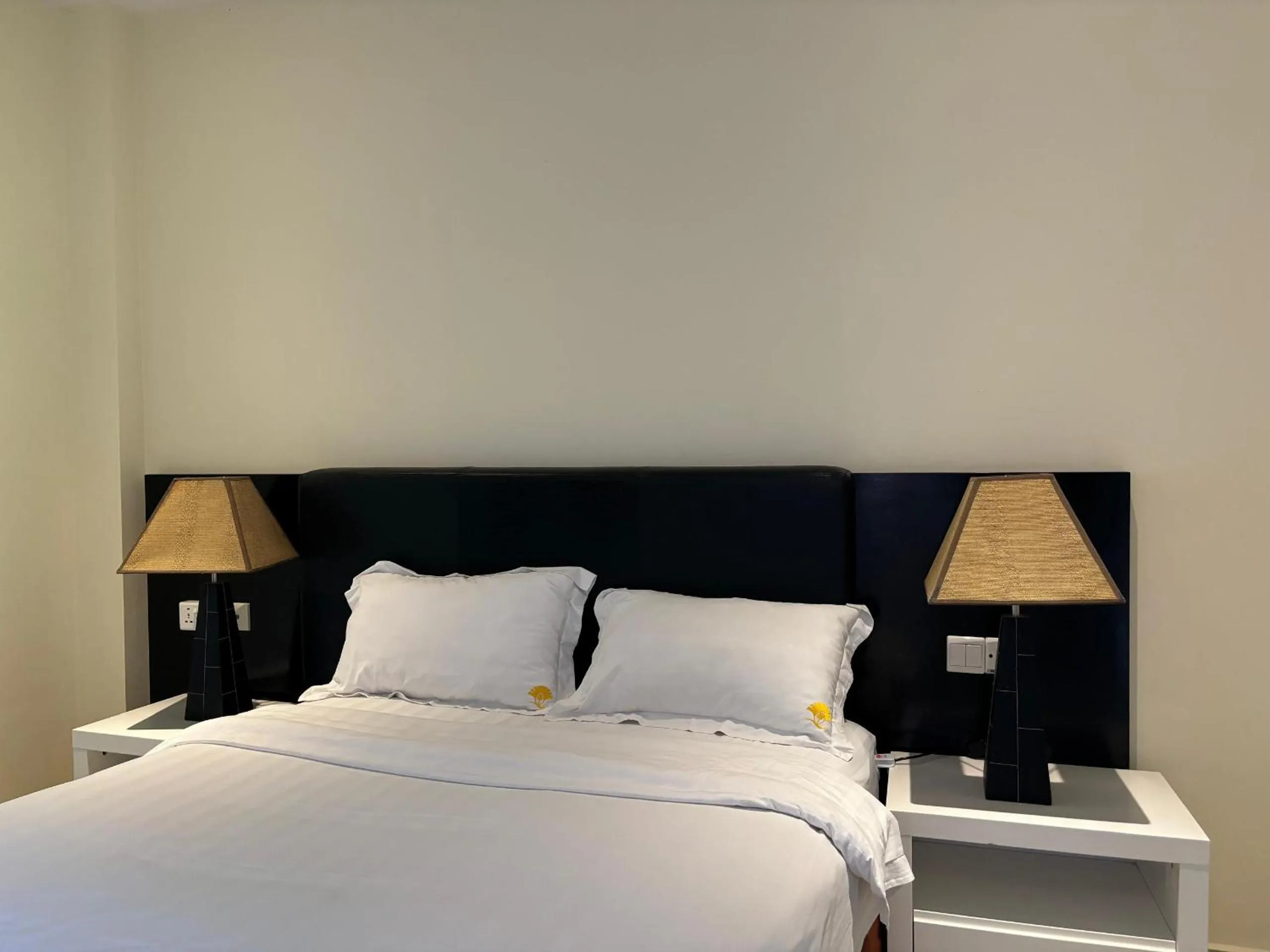 Bed in Palm Beach Hotel Dili