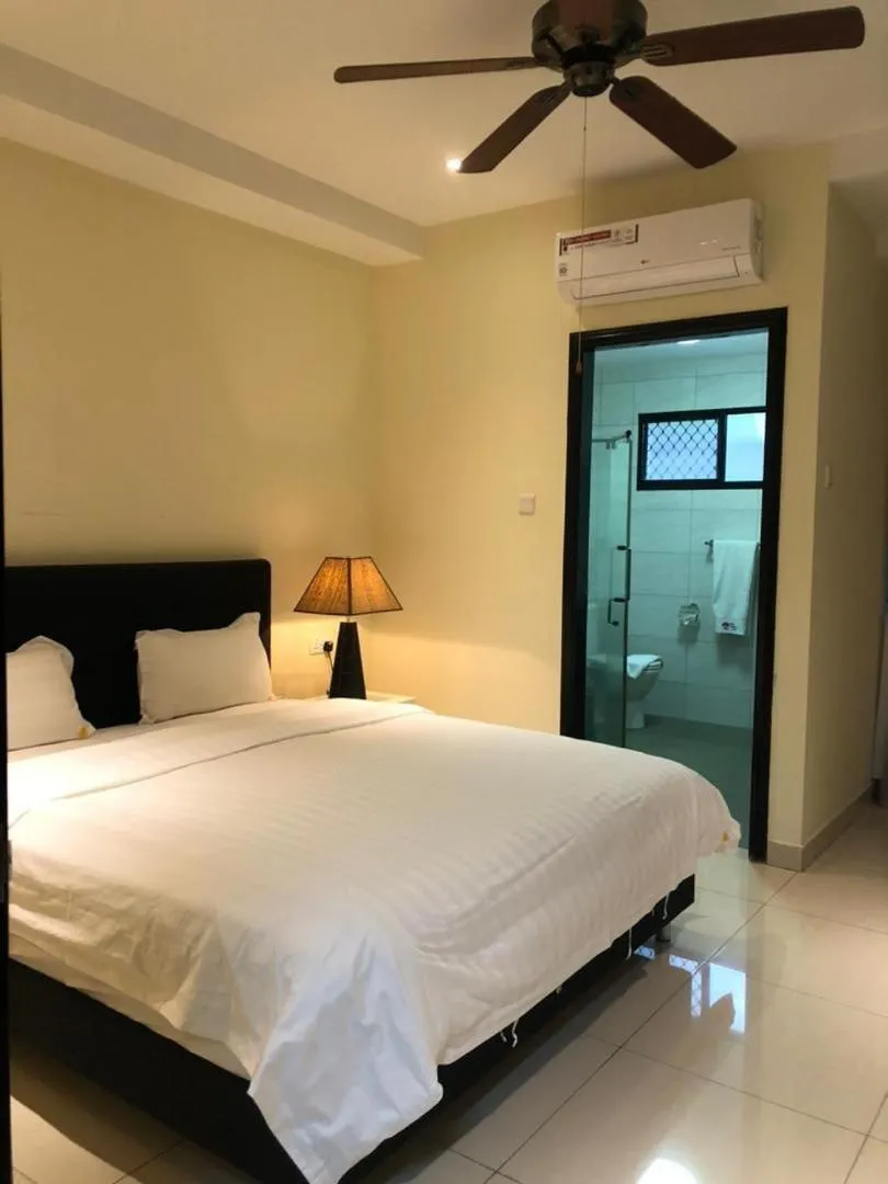 Bed in Palm Beach Hotel Dili