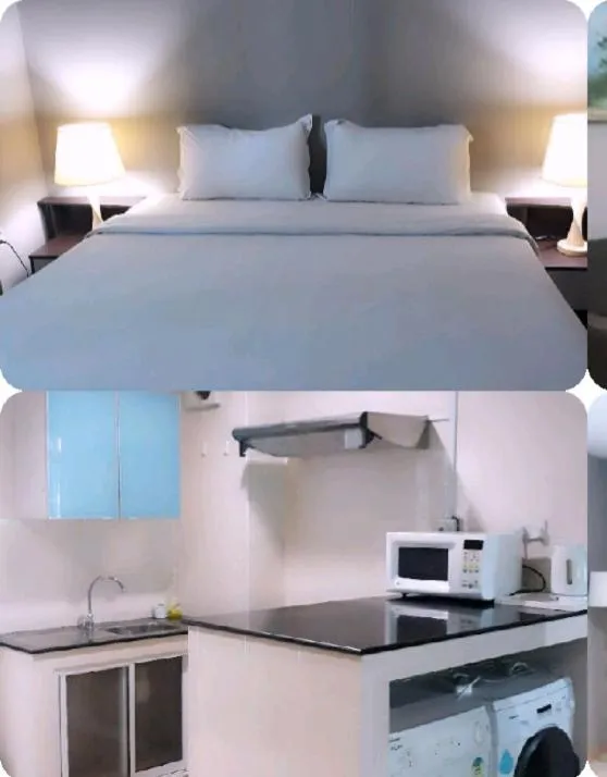 Bed in Ginasuite Hotel