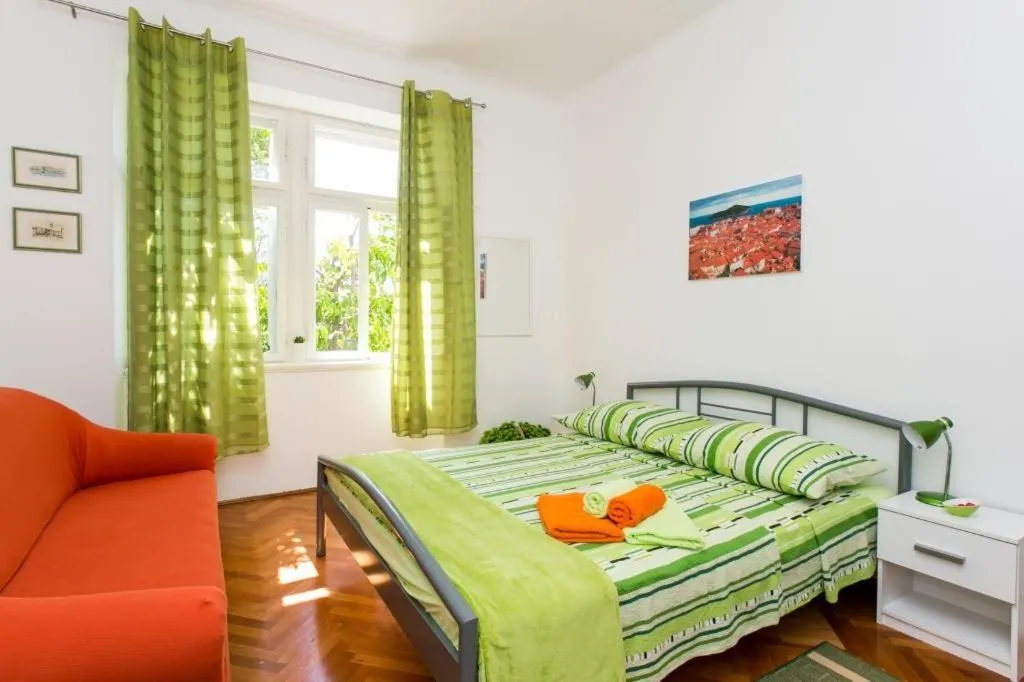 Bedroom, Bed in Apartment Blue & Green