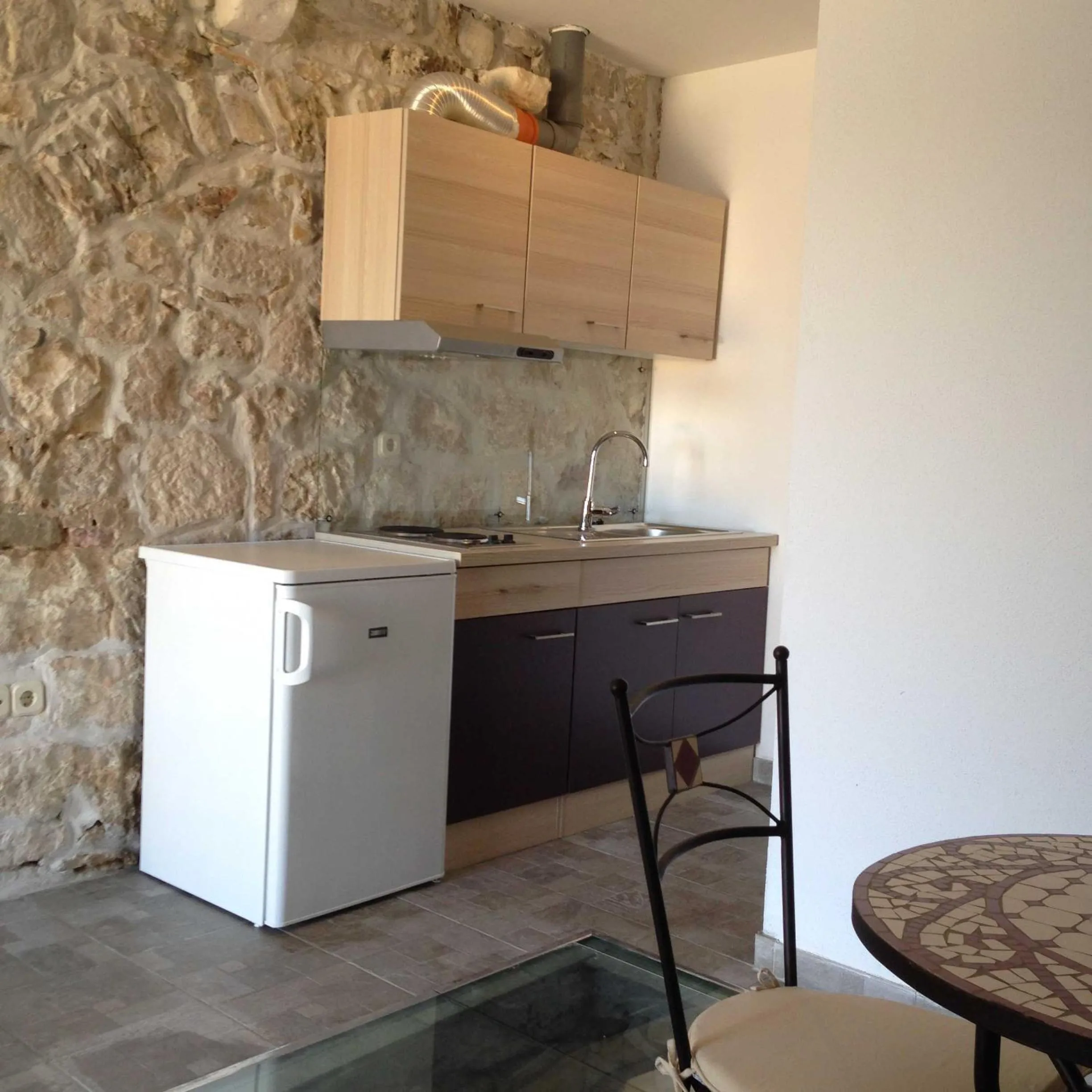 Kitchen or kitchenette in Apartments Acalinović