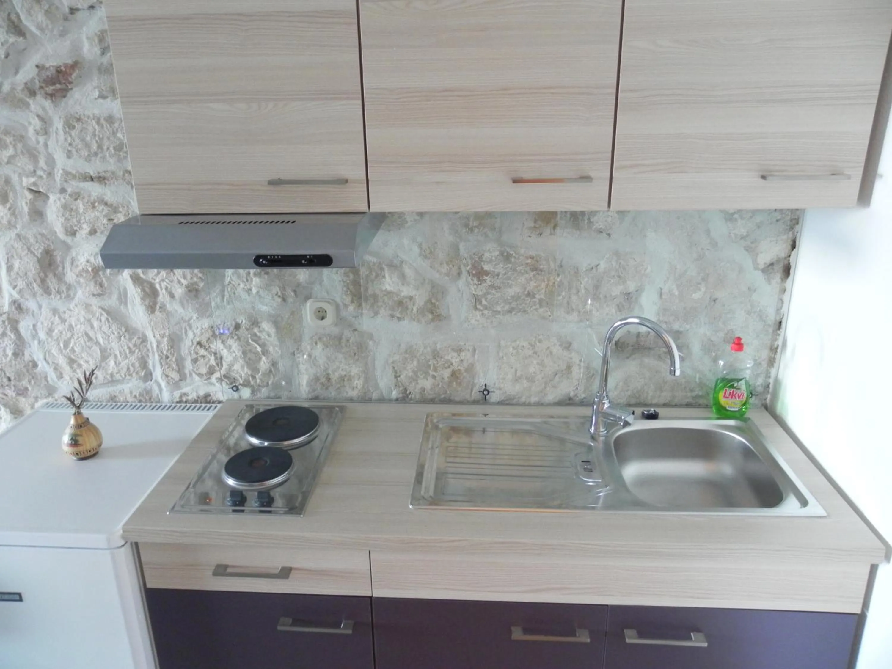 Kitchen or kitchenette in Apartments Acalinović