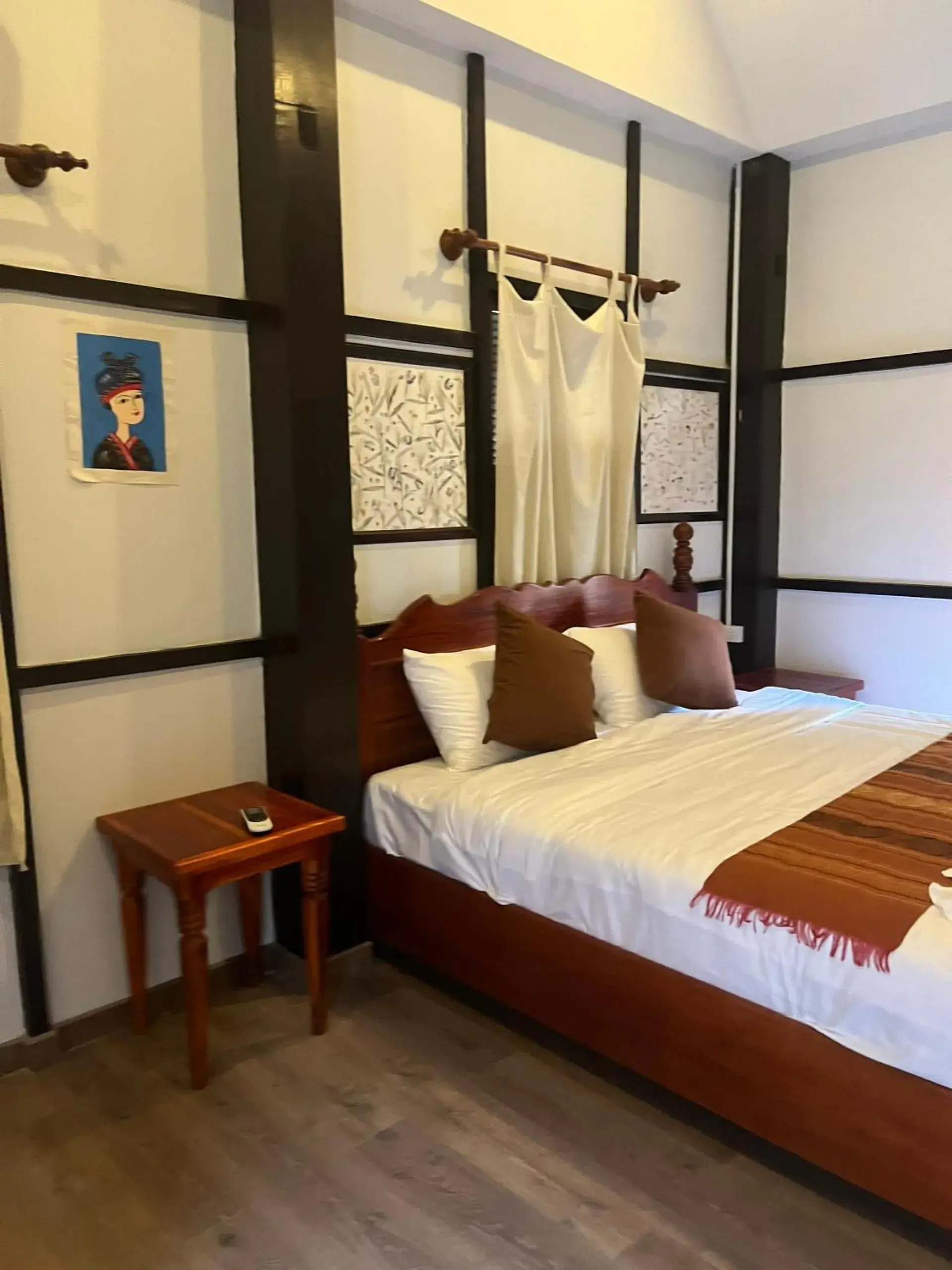 Bed in Villa Namkhan Heritage Bed in Villa Namkhan Heritage