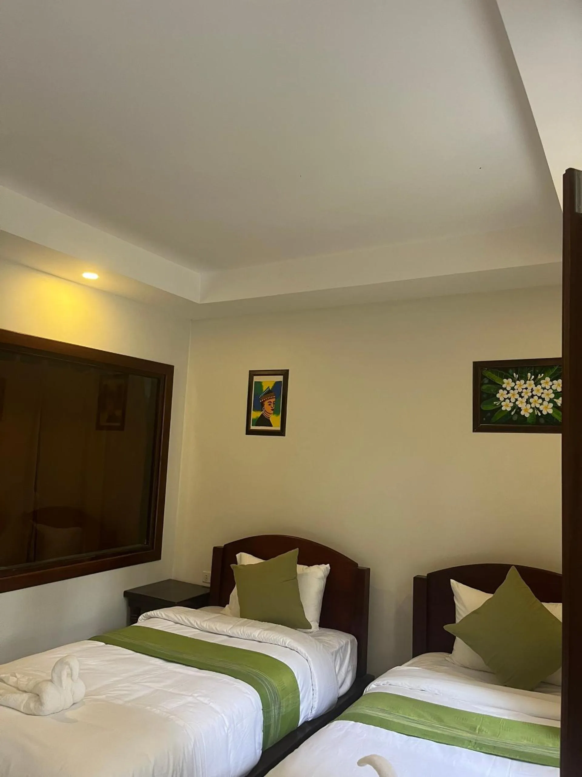 Bed in Villa Namkhan Heritage