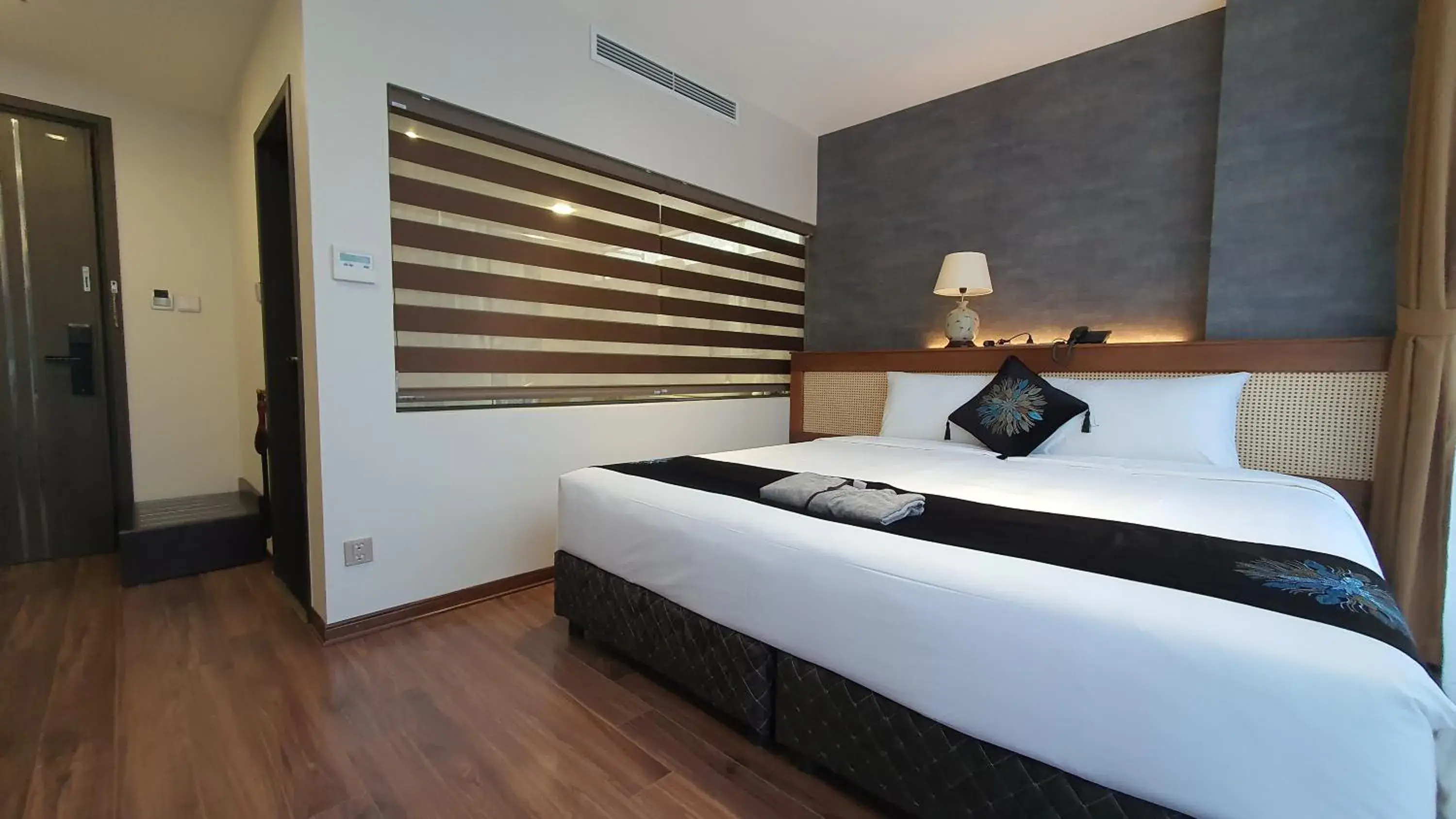 Bedroom, Bed in MOMIZI HANOI 2 - PHAN KE BINH Bedroom, Bed in MOMIZI HANOI 2 - PHAN KE BINH
