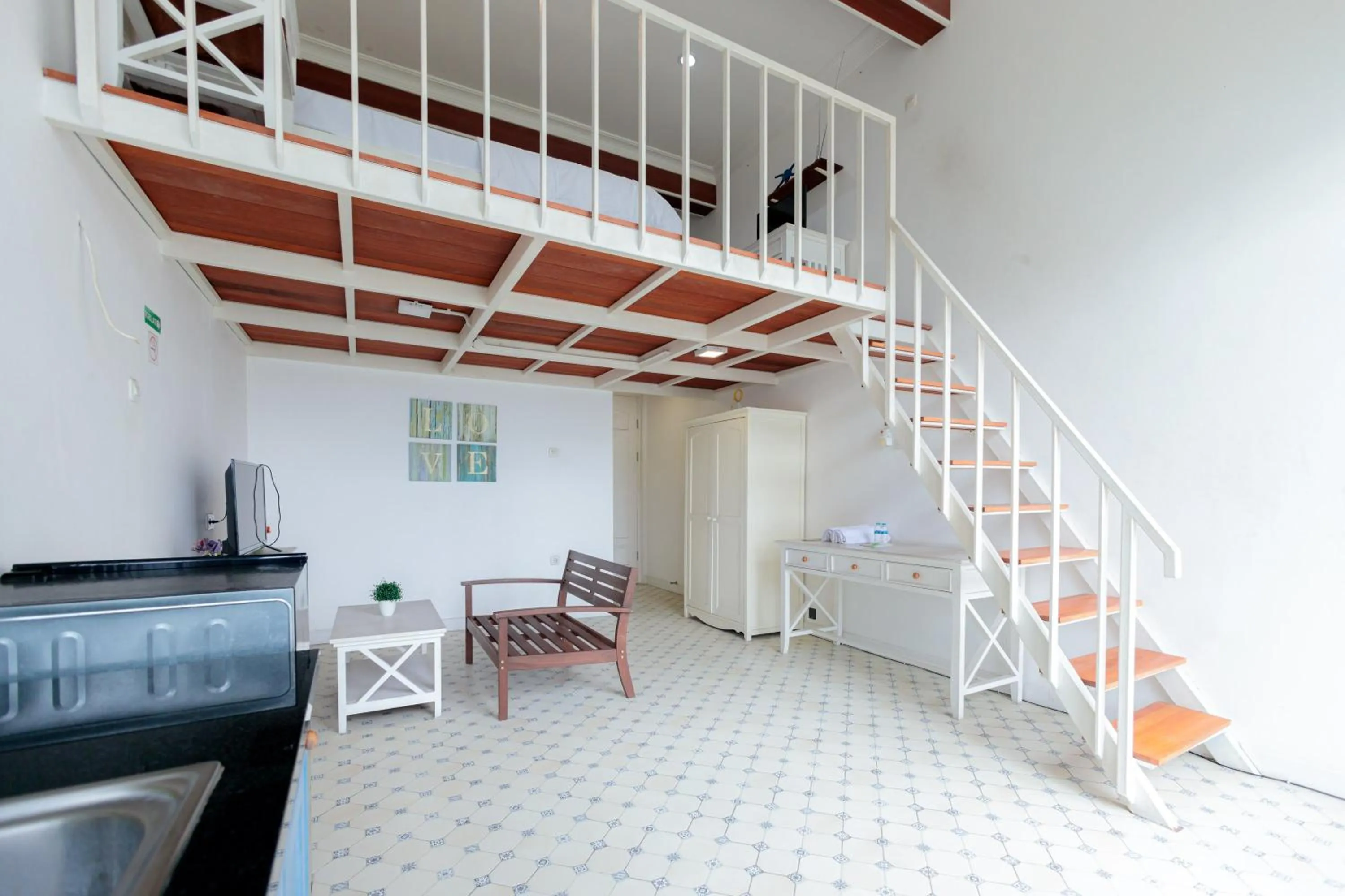 TV and multimedia in Urbanview Blessing Residence Surabaya by RedDoorz