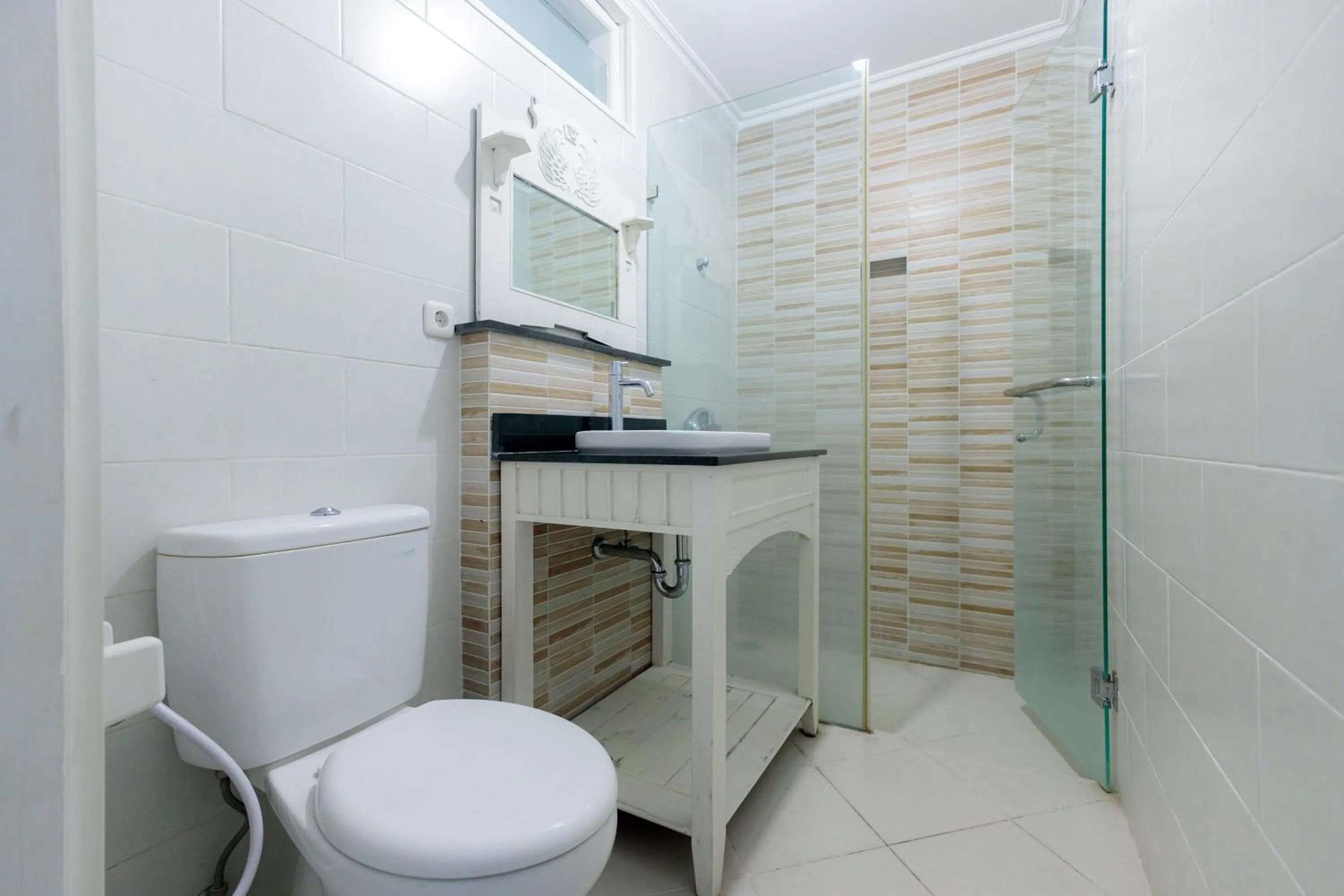 Bathroom in Urbanview Blessing Residence Surabaya by RedDoorz