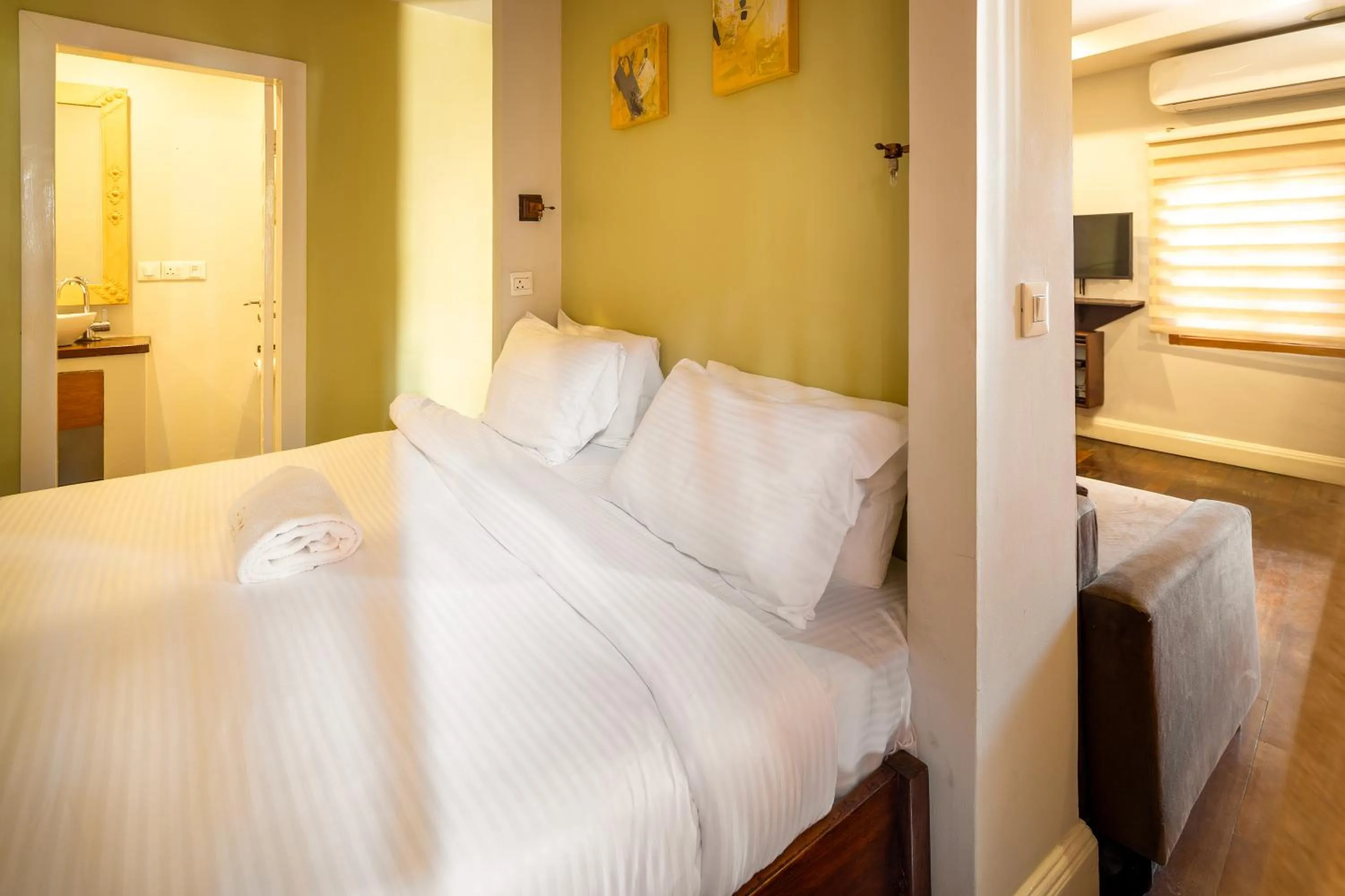 Bed in Olma Hotel & Suites