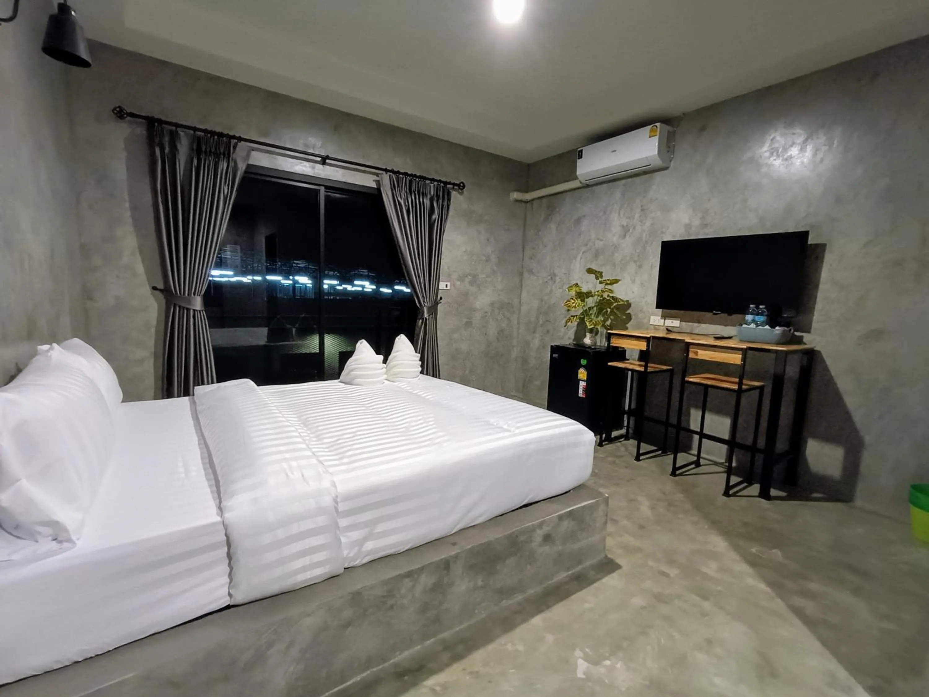 Bed in The Loftel Resort