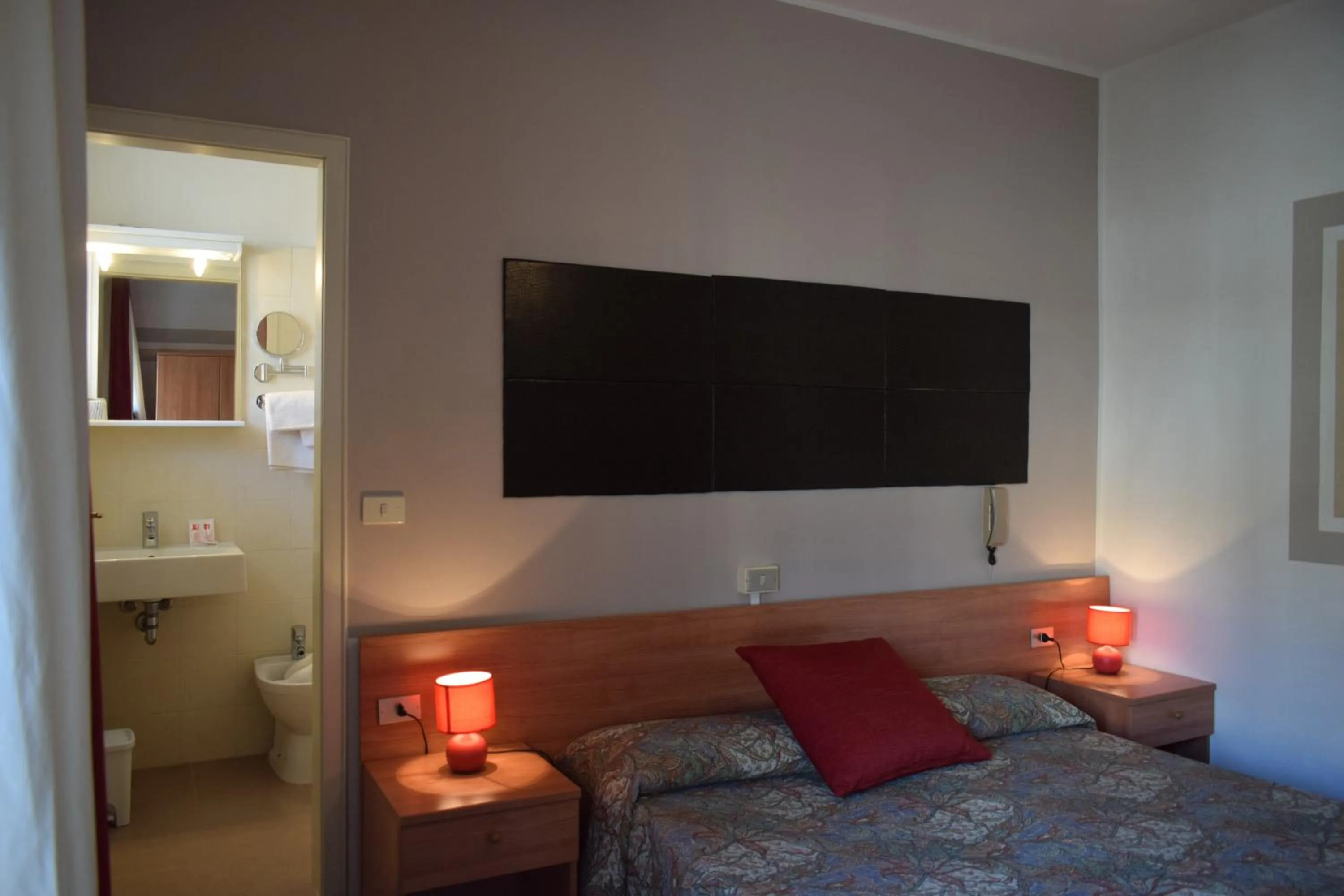 Bed in Albergo Al Pescatore