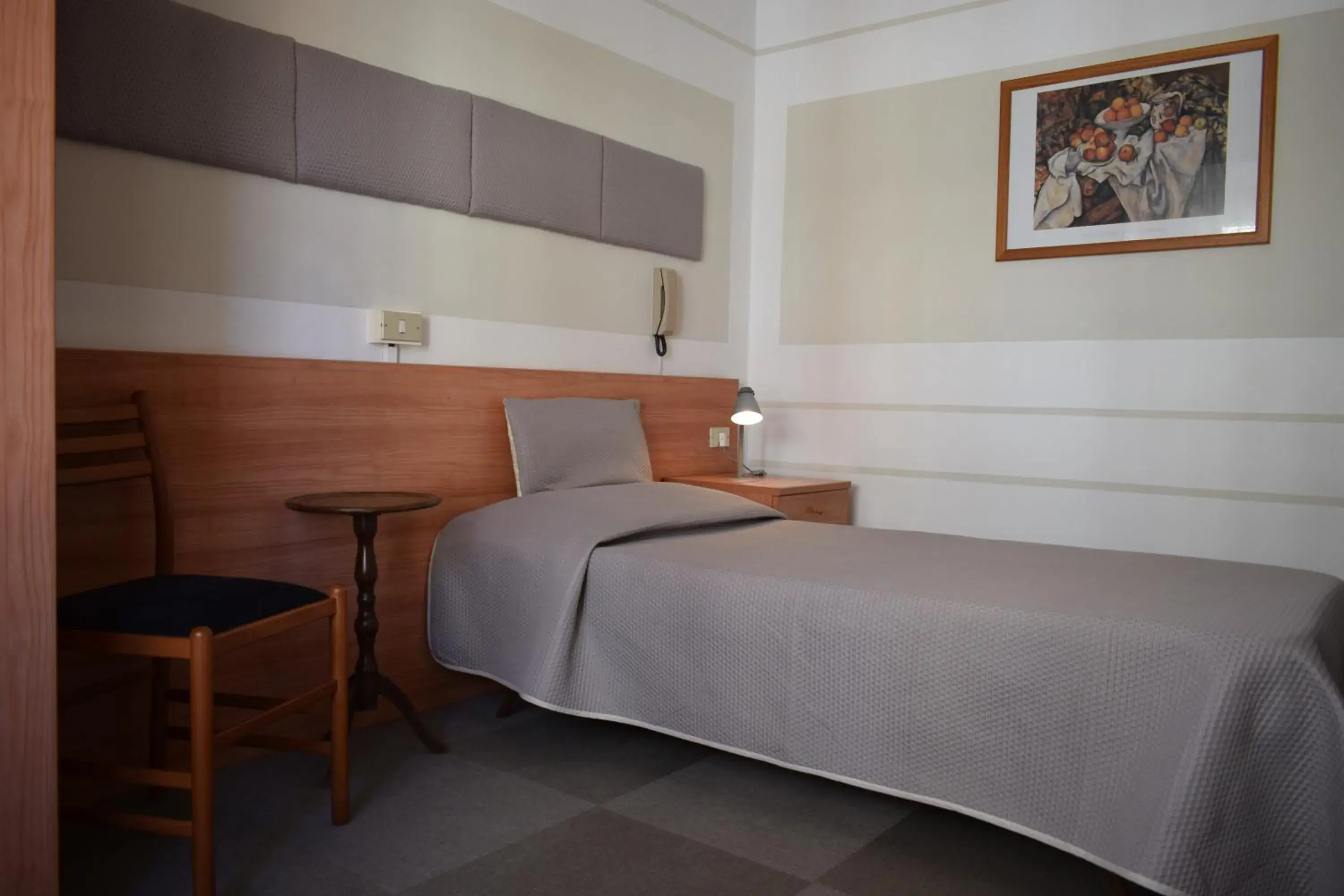 Bed in Albergo Al Pescatore