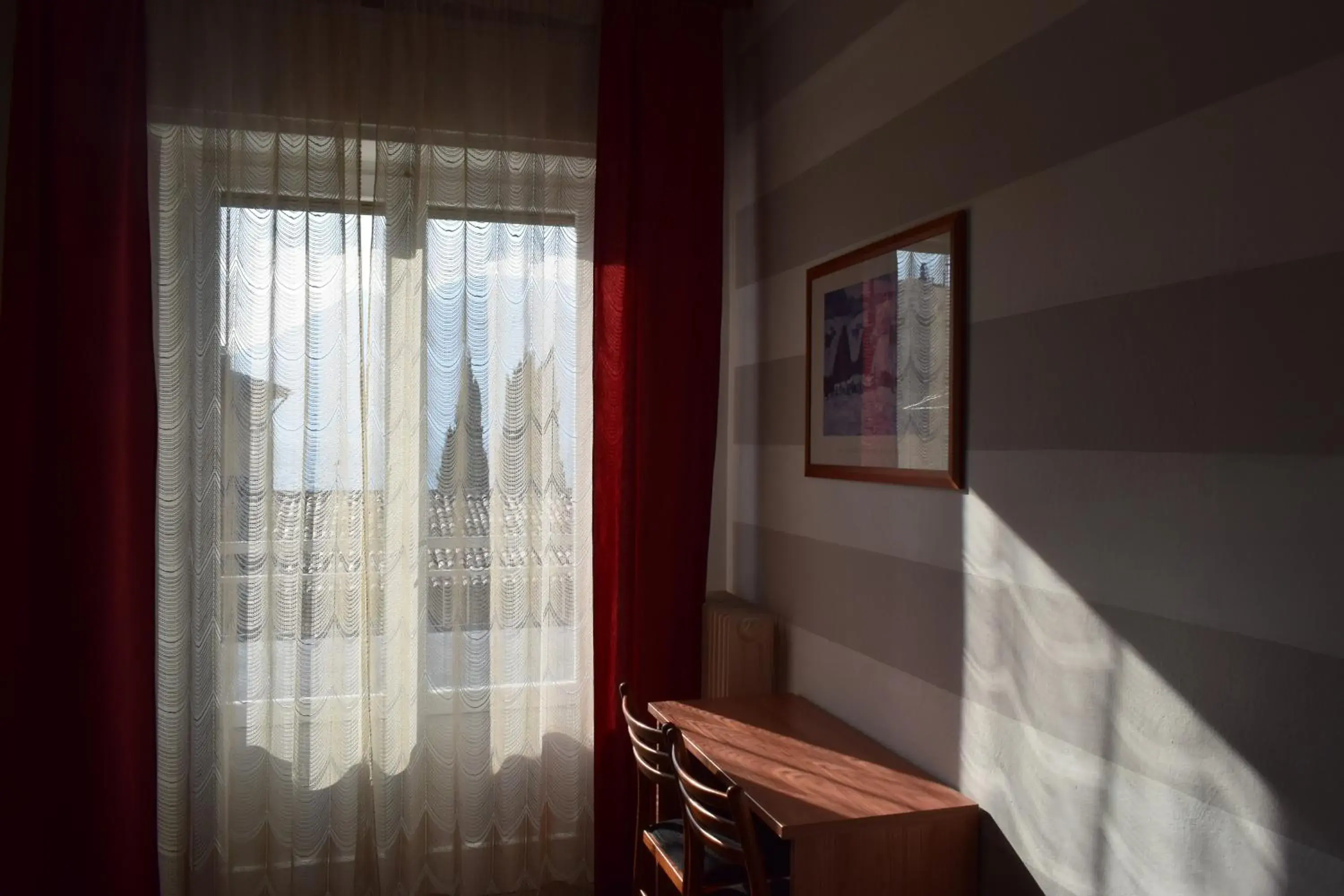 Photo of the whole room, TV/Entertainment Center in Albergo Al Pescatore