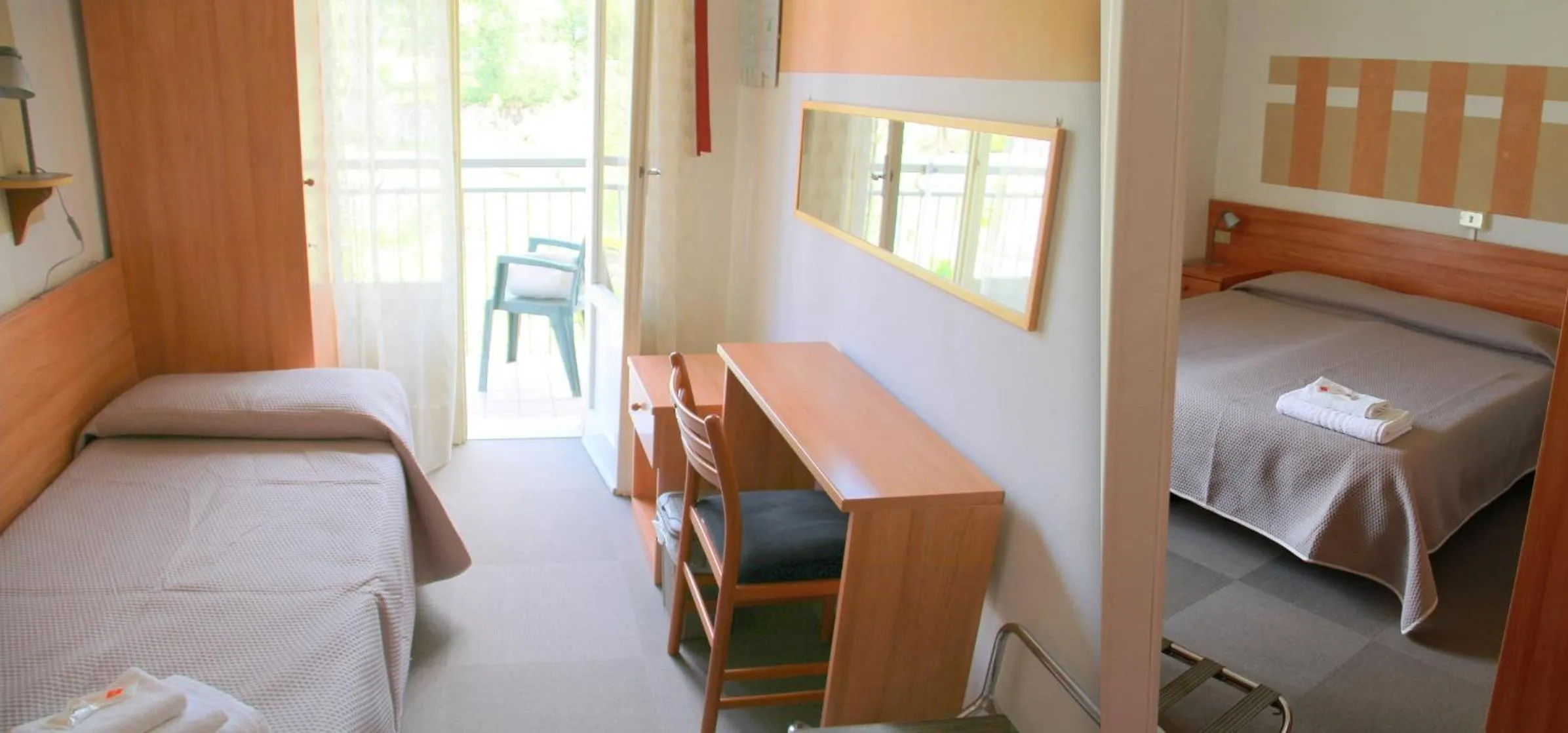 Bed in Albergo Al Pescatore