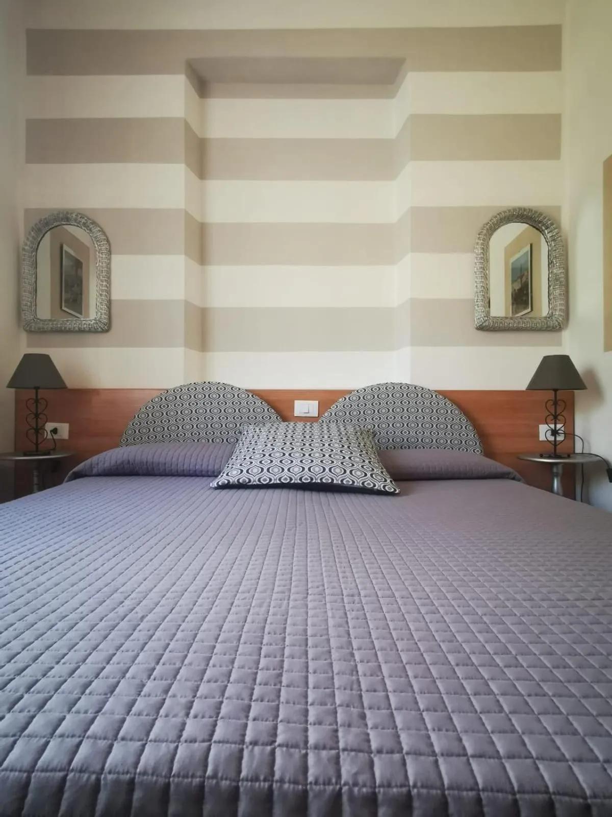 Bed in Albergo Al Pescatore