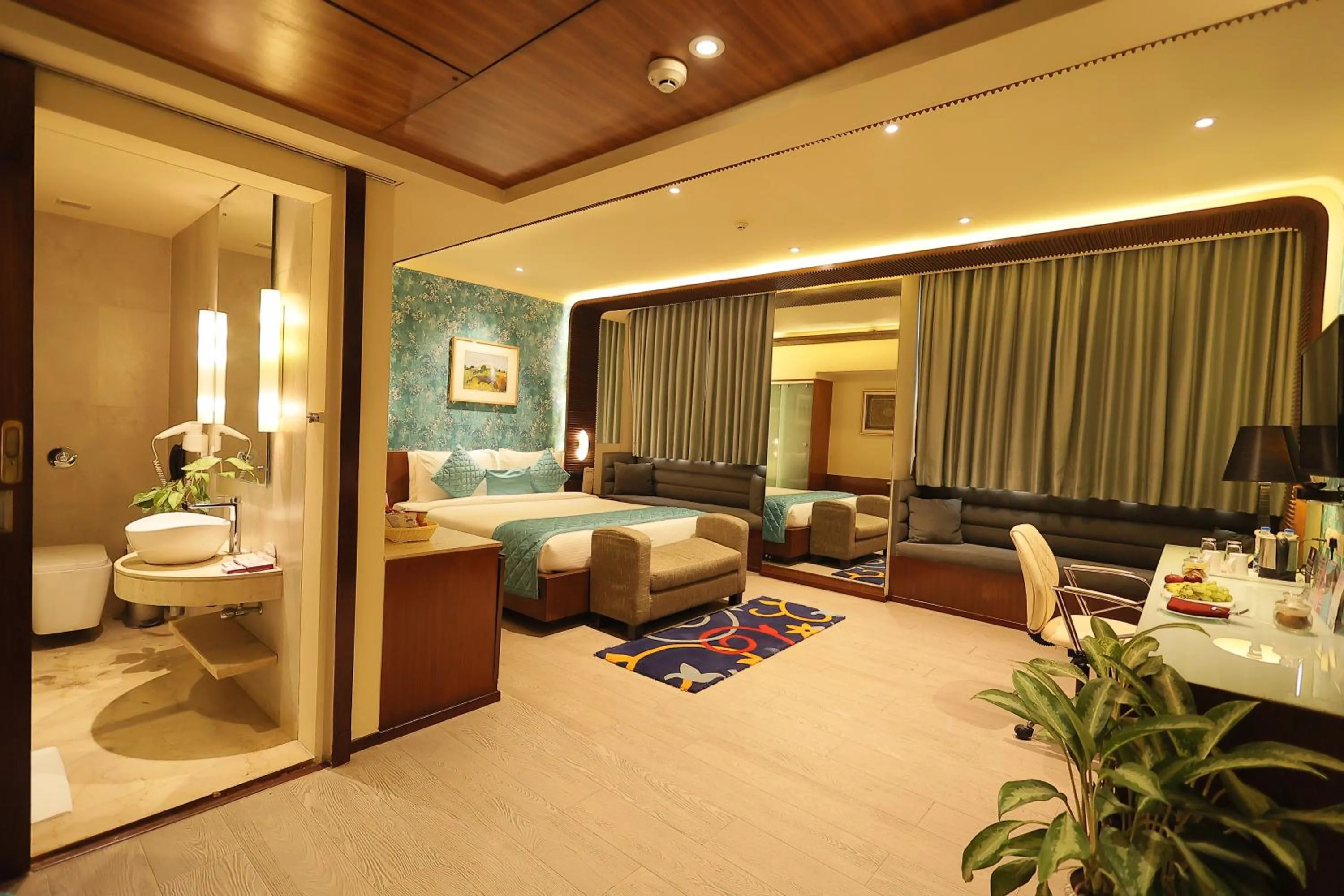 Bedroom in Regenta Orkos Kolkata by Royal Orchid Hotels Limited