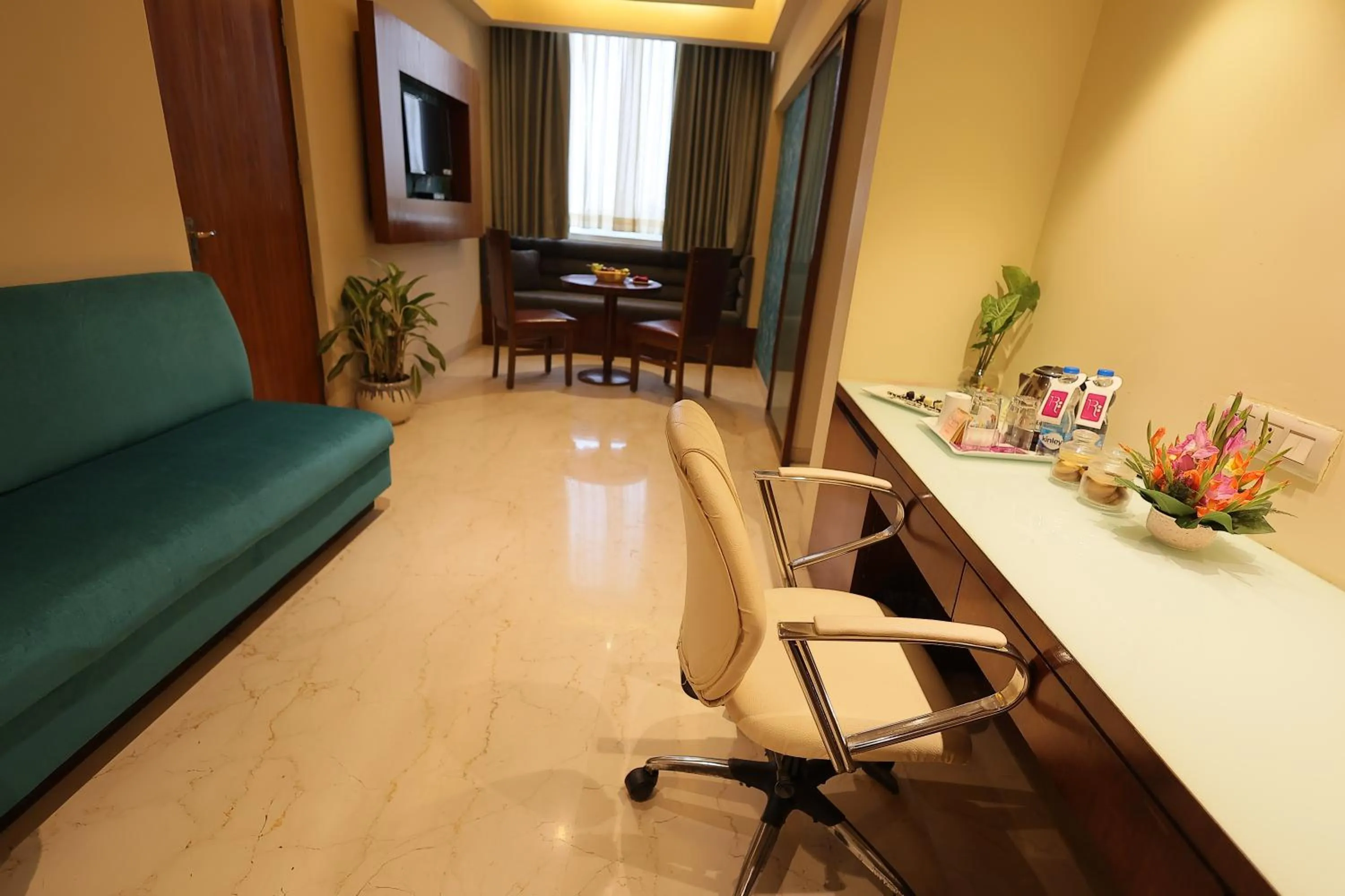 Living room in Regenta Orkos Kolkata by Royal Orchid Hotels Limited