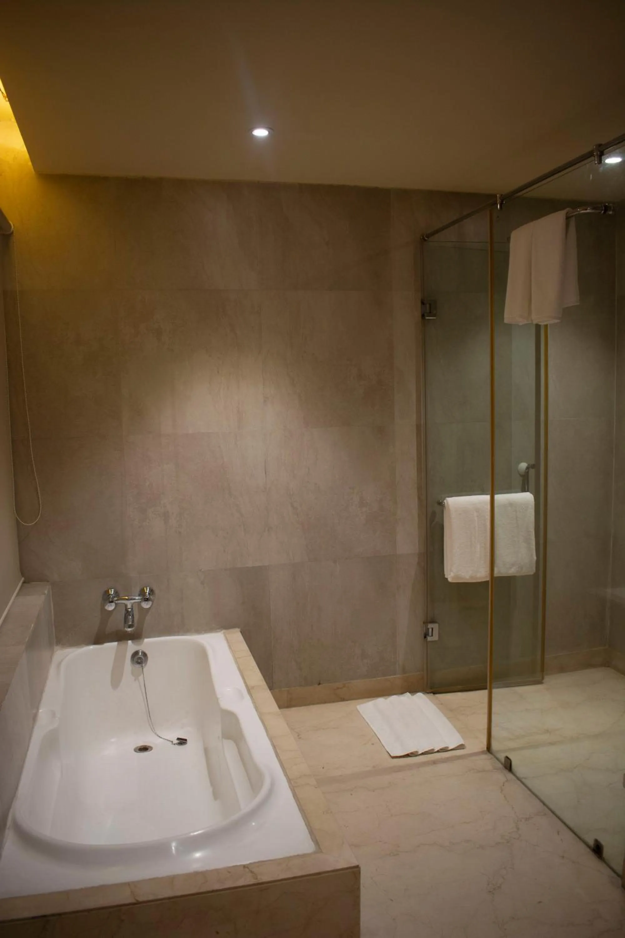 Bathroom in Regenta Orkos Kolkata by Royal Orchid Hotels Limited