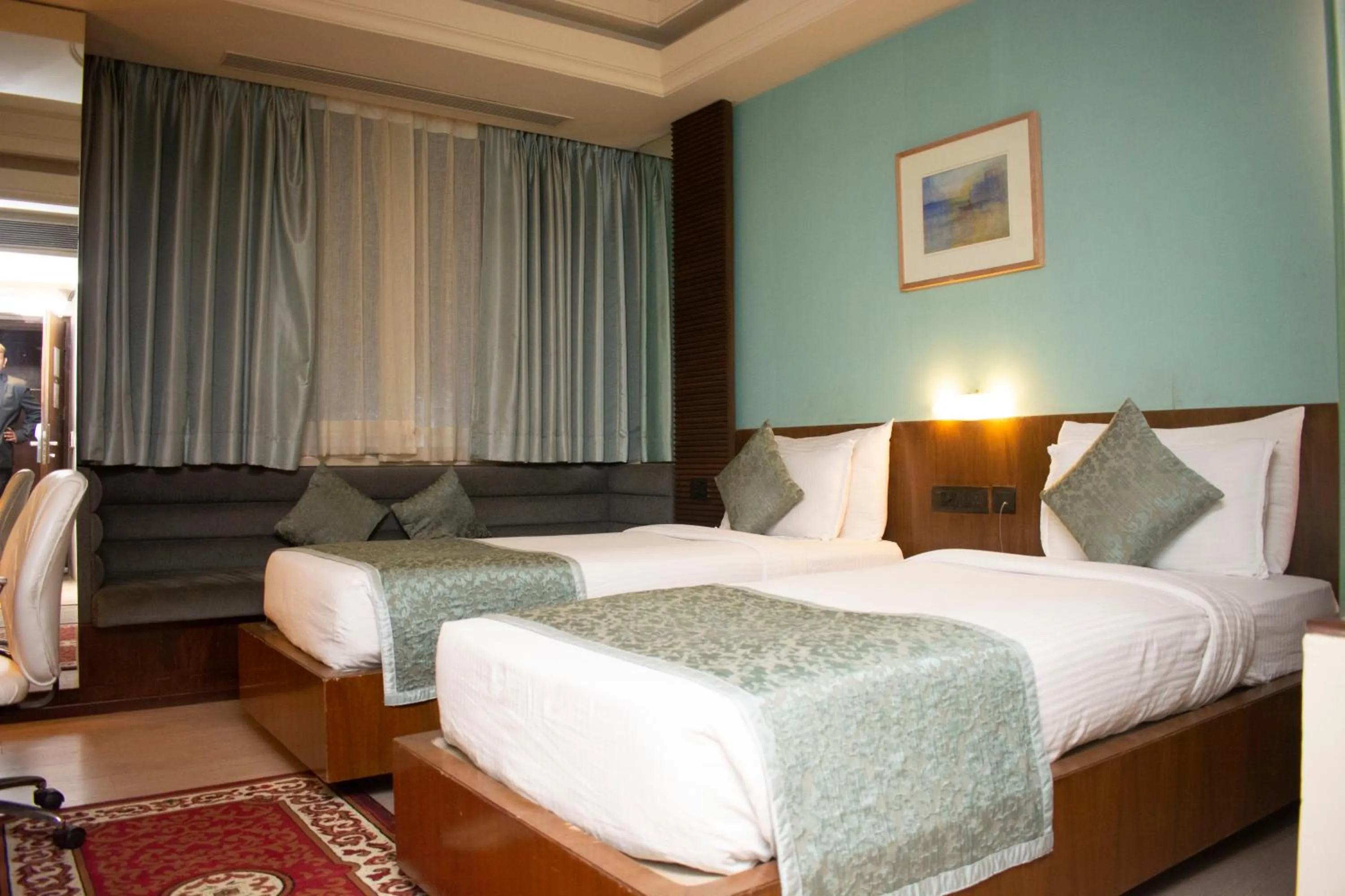 Bed in Regenta Orkos Kolkata by Royal Orchid Hotels Limited