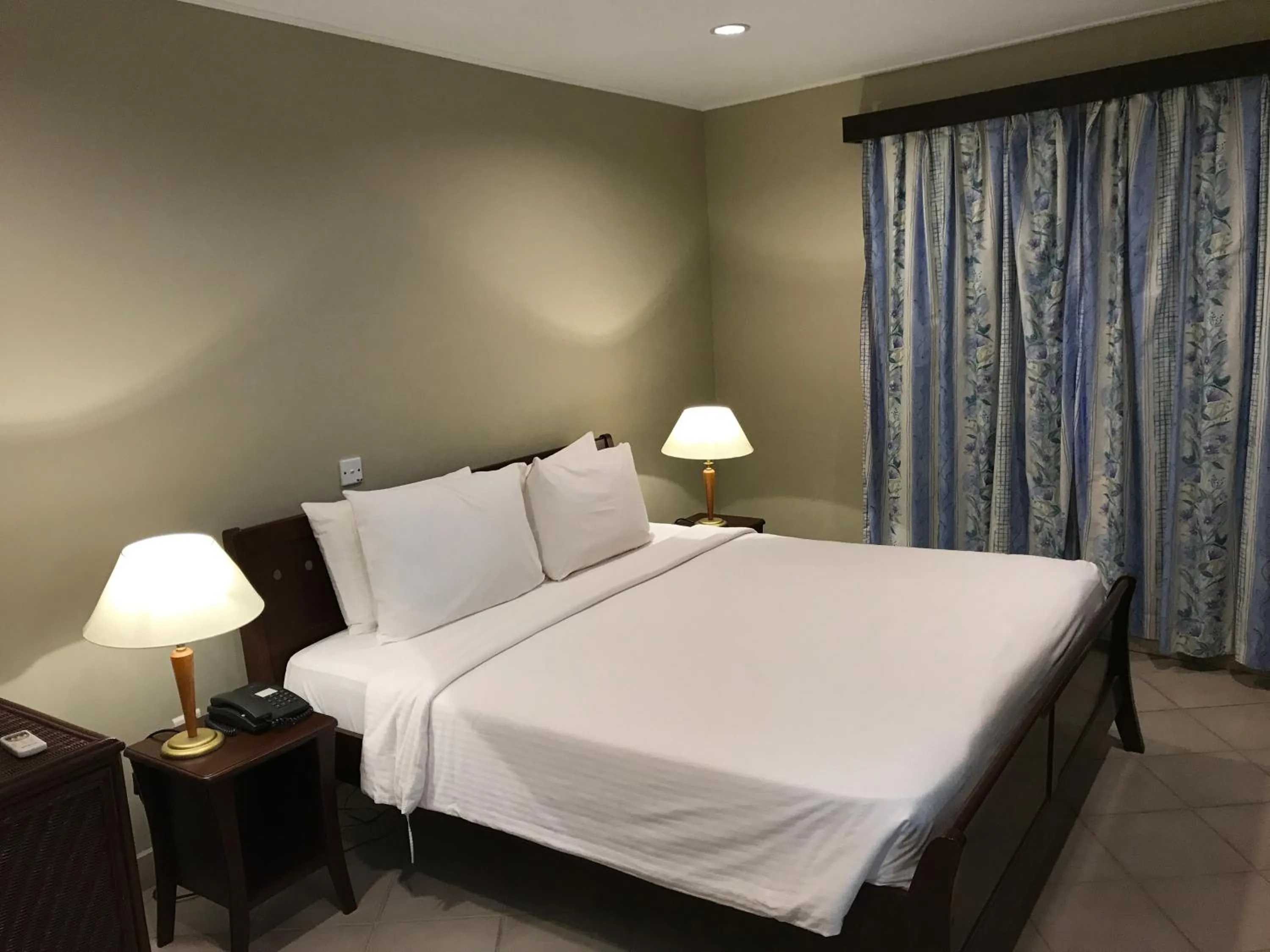 Photo of the whole room, Bed in Berjaya Praslin Resort