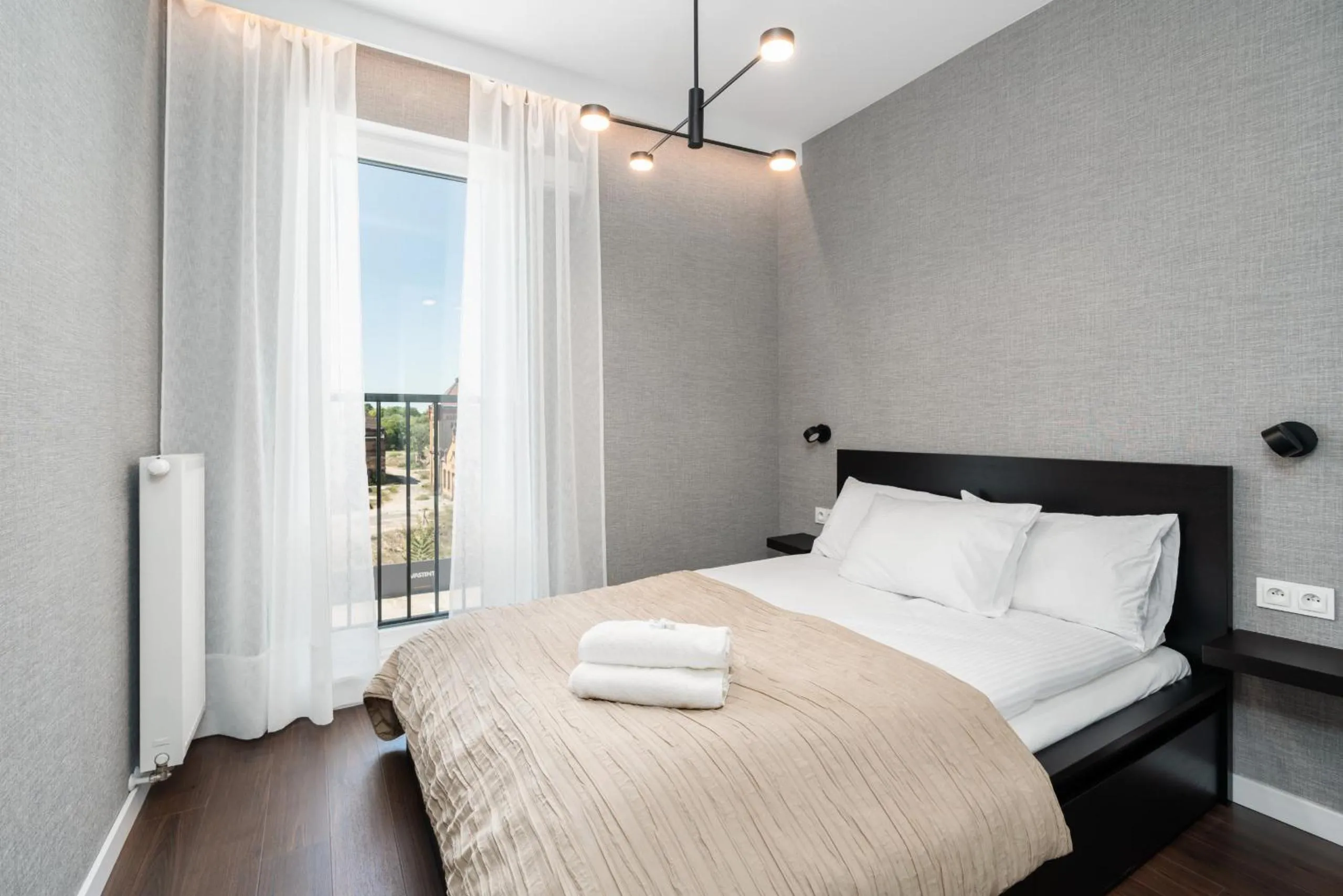 Stylish & Comfy Garbary Apartments with Parking by Noclegi Renters