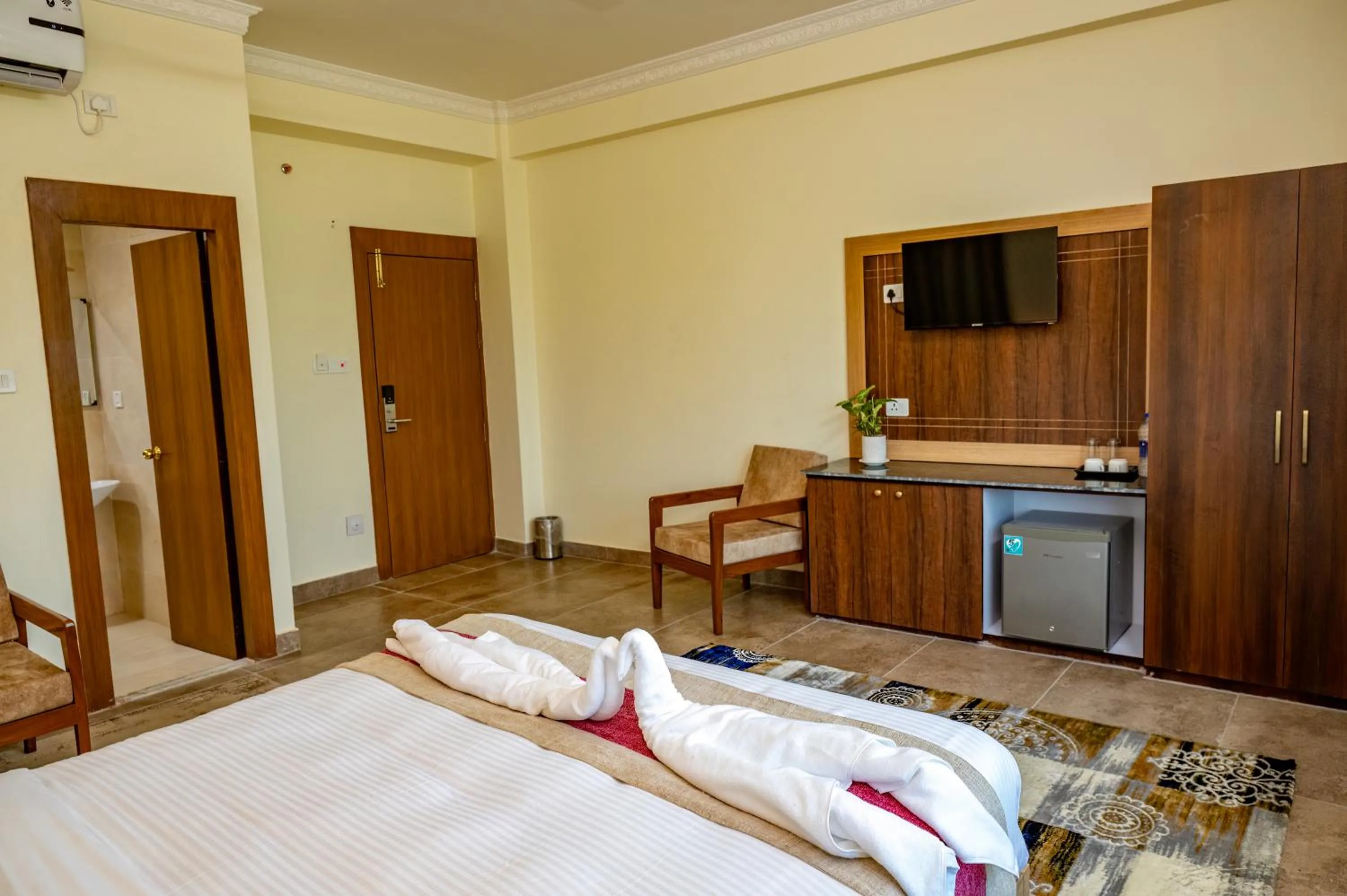 Toilet, Bed in Lumbini Five Elements Hotel