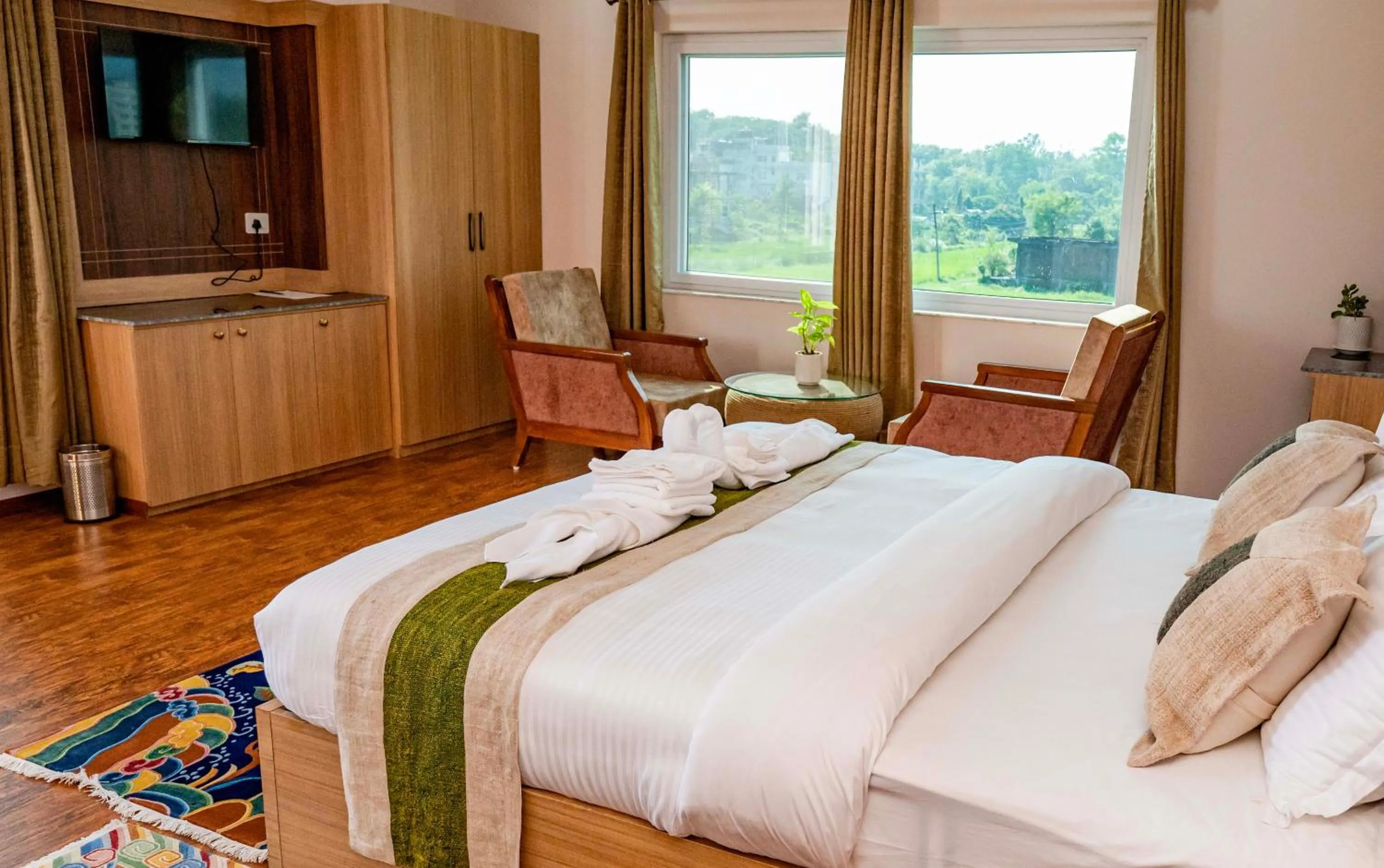 Communal lounge/ TV room, Bed in Lumbini Five Elements Hotel