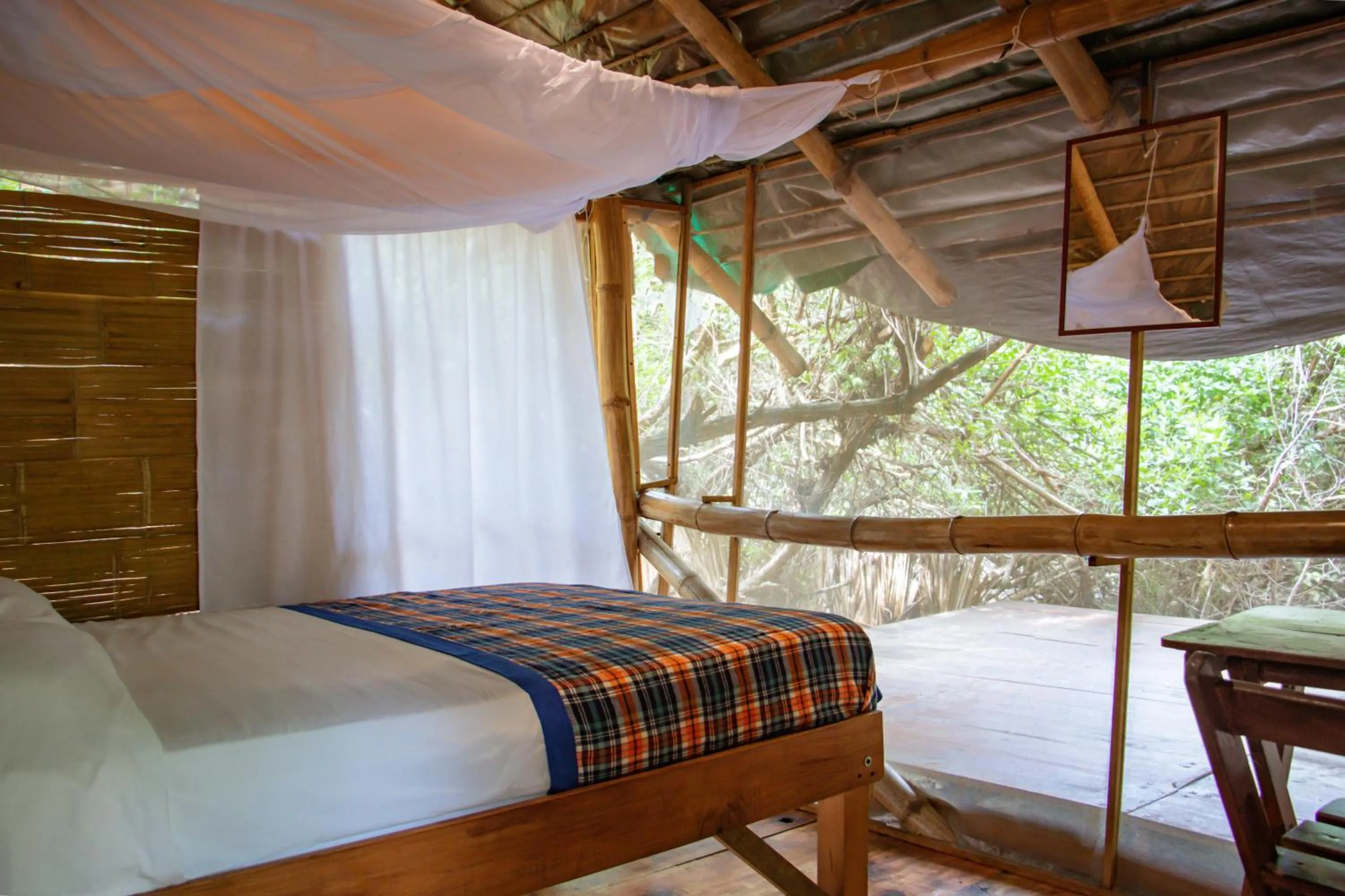 Bed in Posada Corazon Mazunte