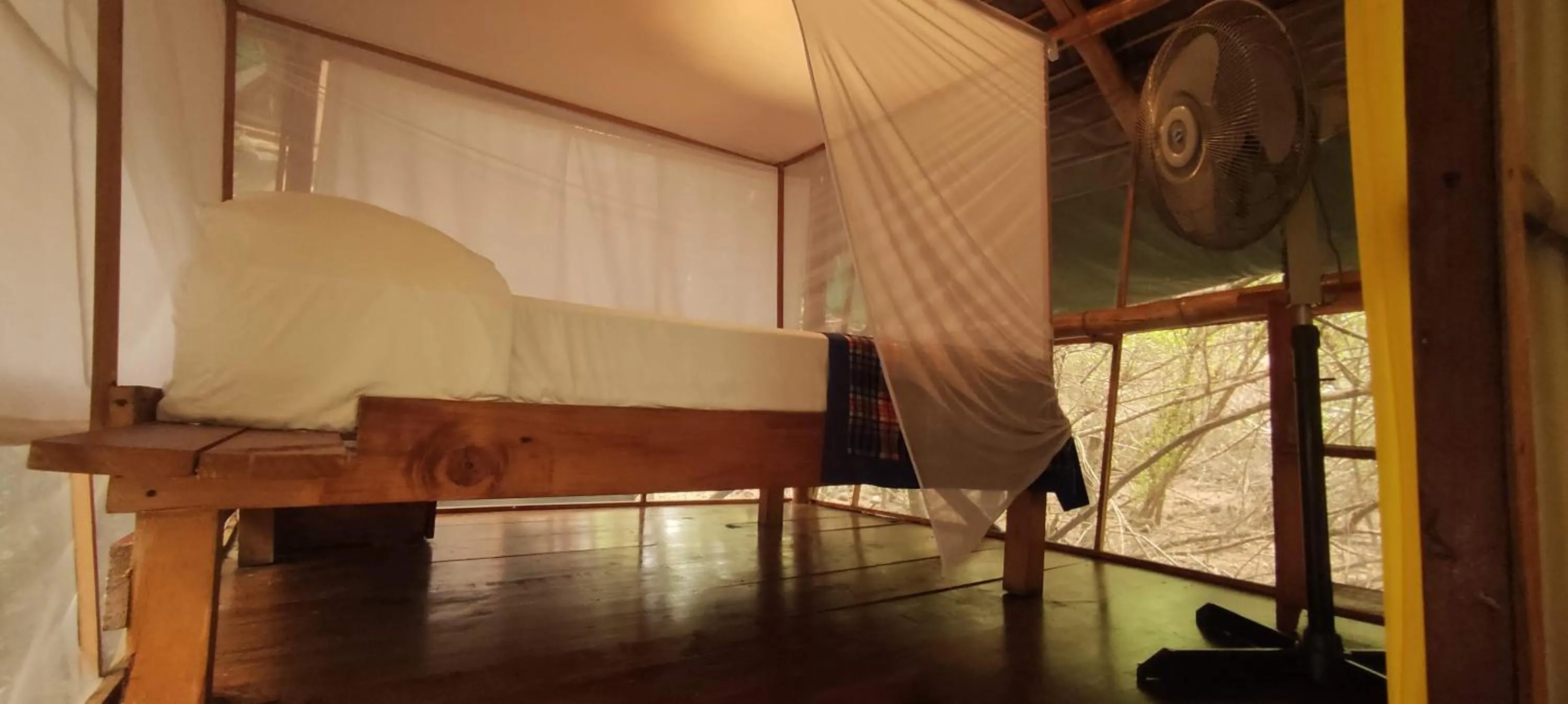 Bed in Posada Corazon Mazunte