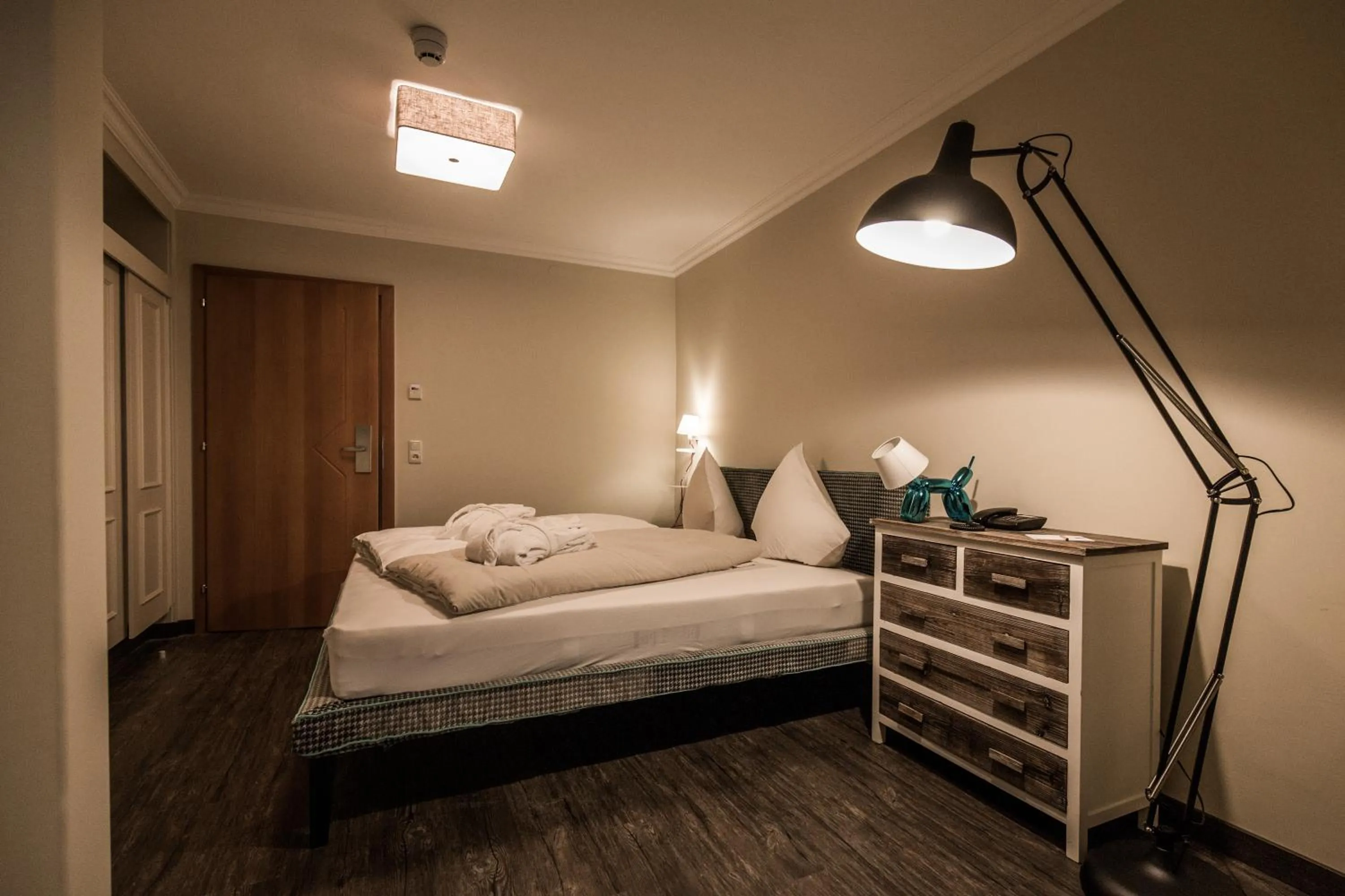 Photo of the whole room, Bed in THOMSN Central Hotel & Appartements