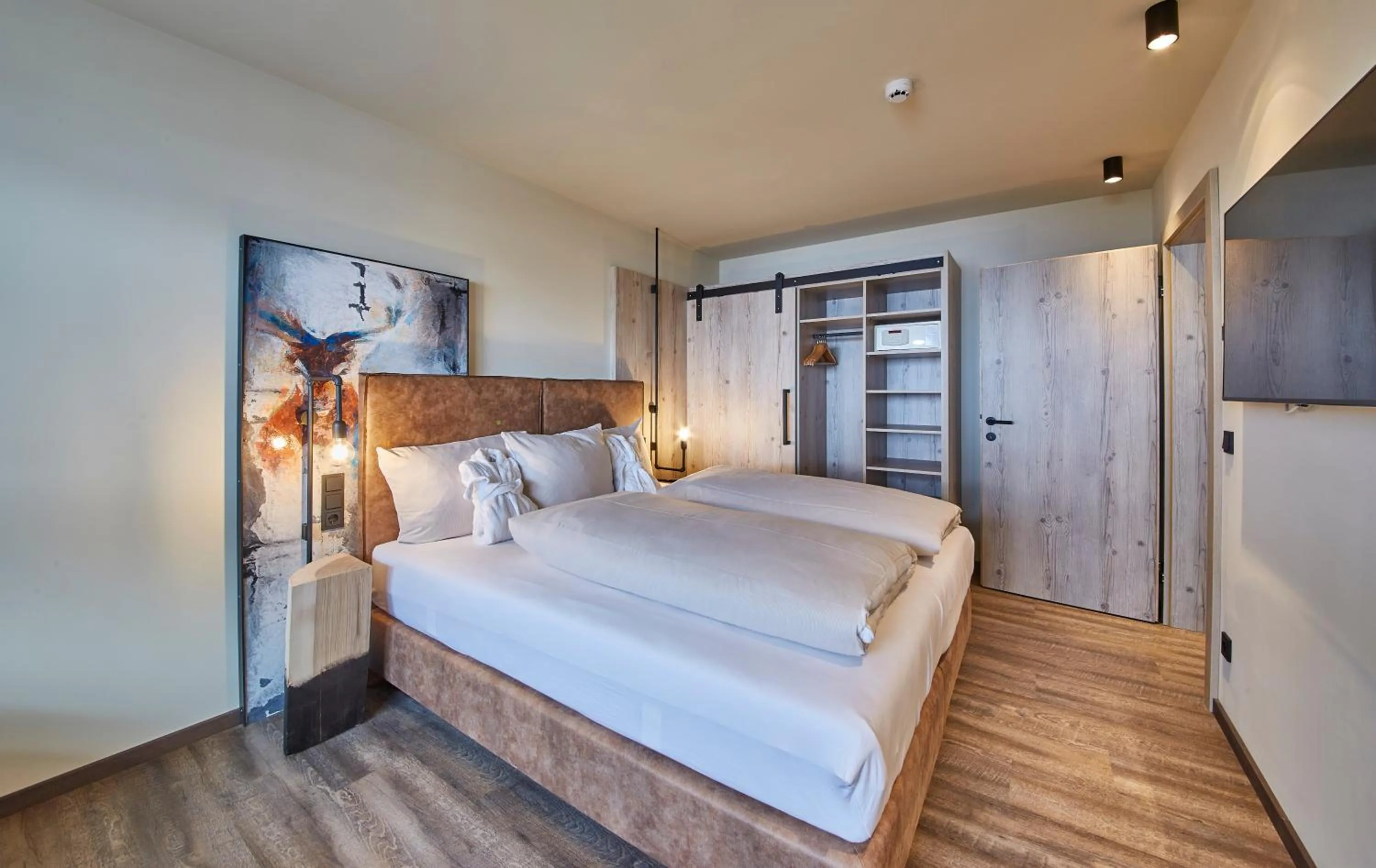 Photo of the whole room, Bed in THOMSN Central Hotel & Appartements