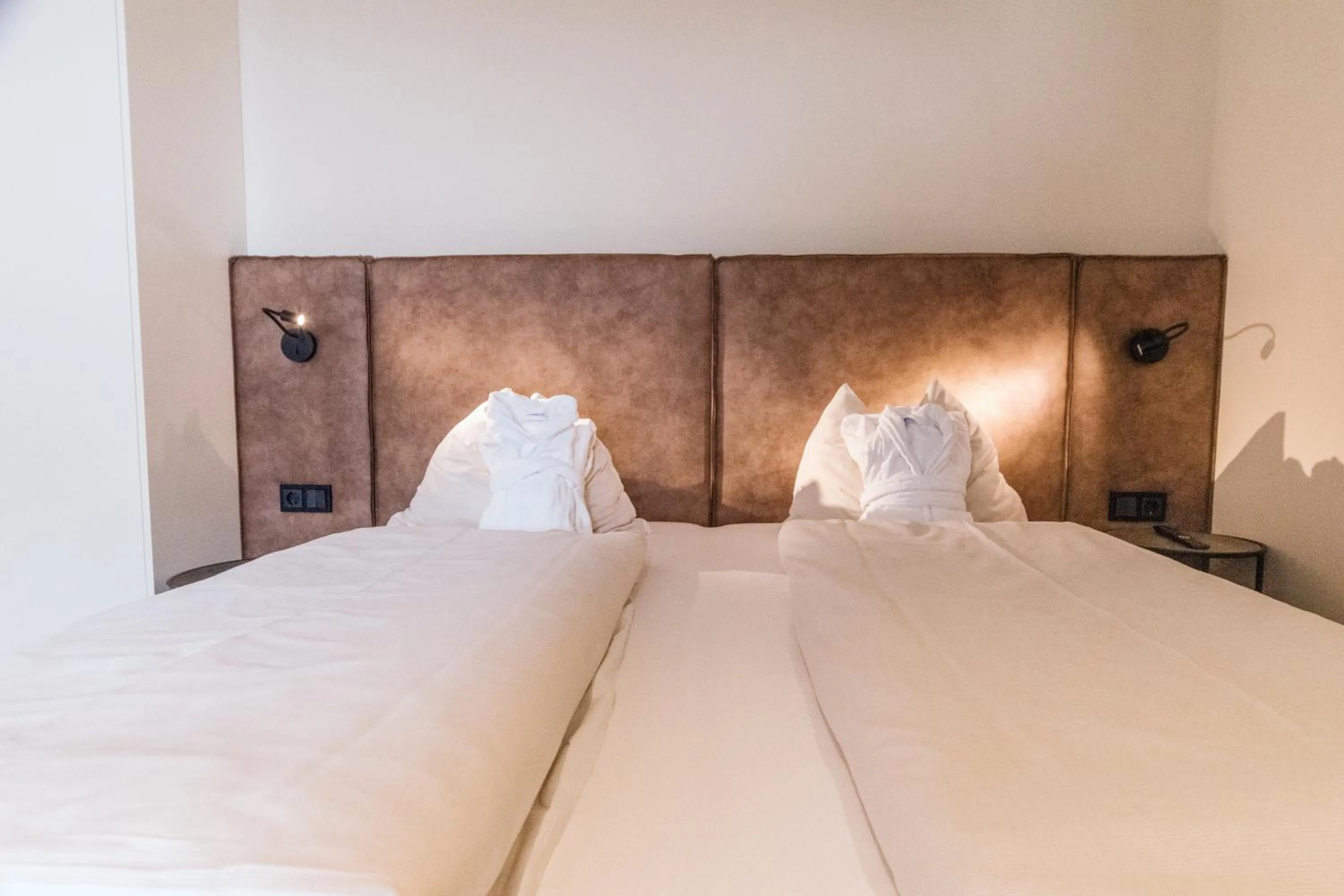 Bed in THOMSN Central Hotel & Appartements