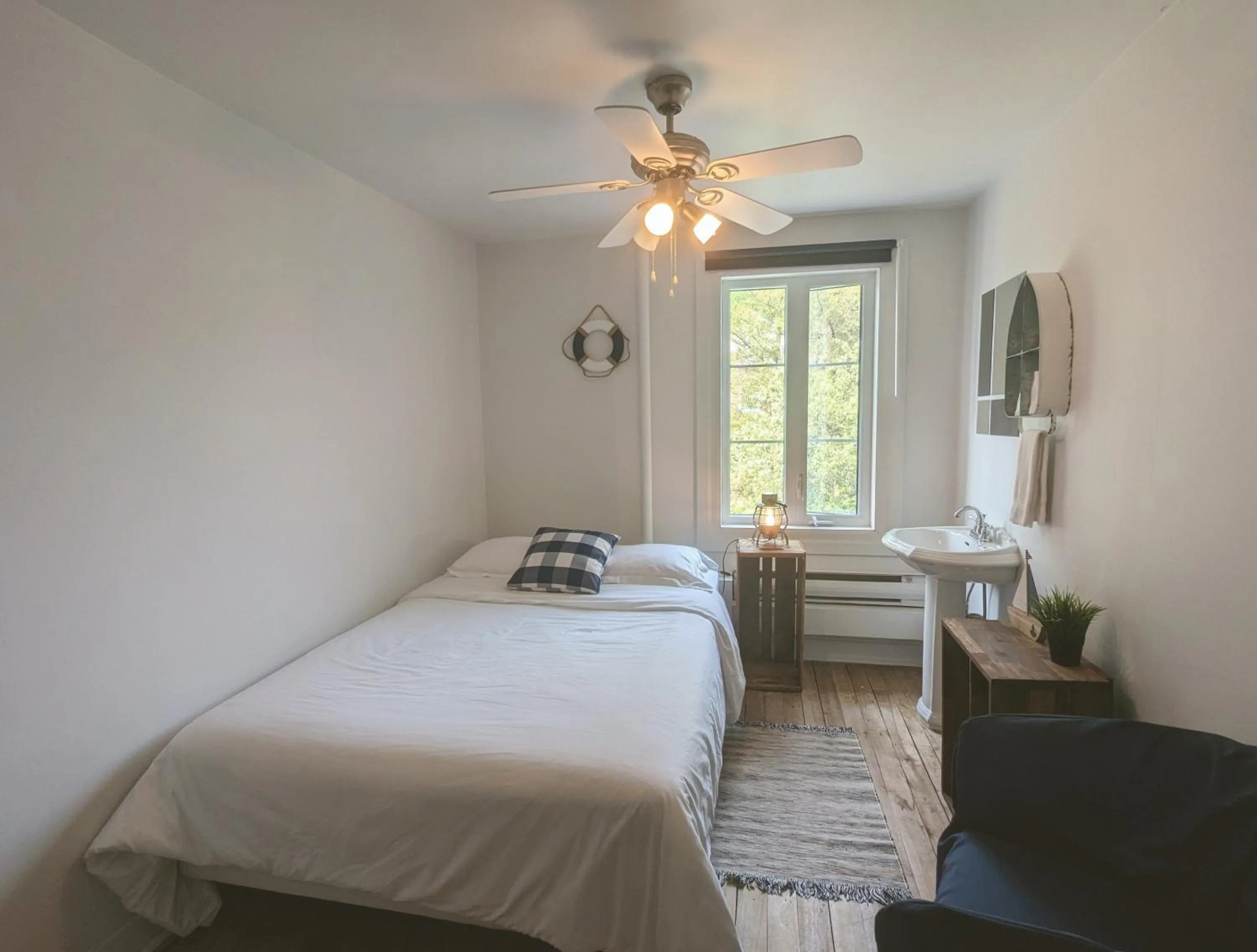 Bed in Auberge de la rive de Charlevoix - Auberge de jeunesse familiale pour voyageurs de tous âges