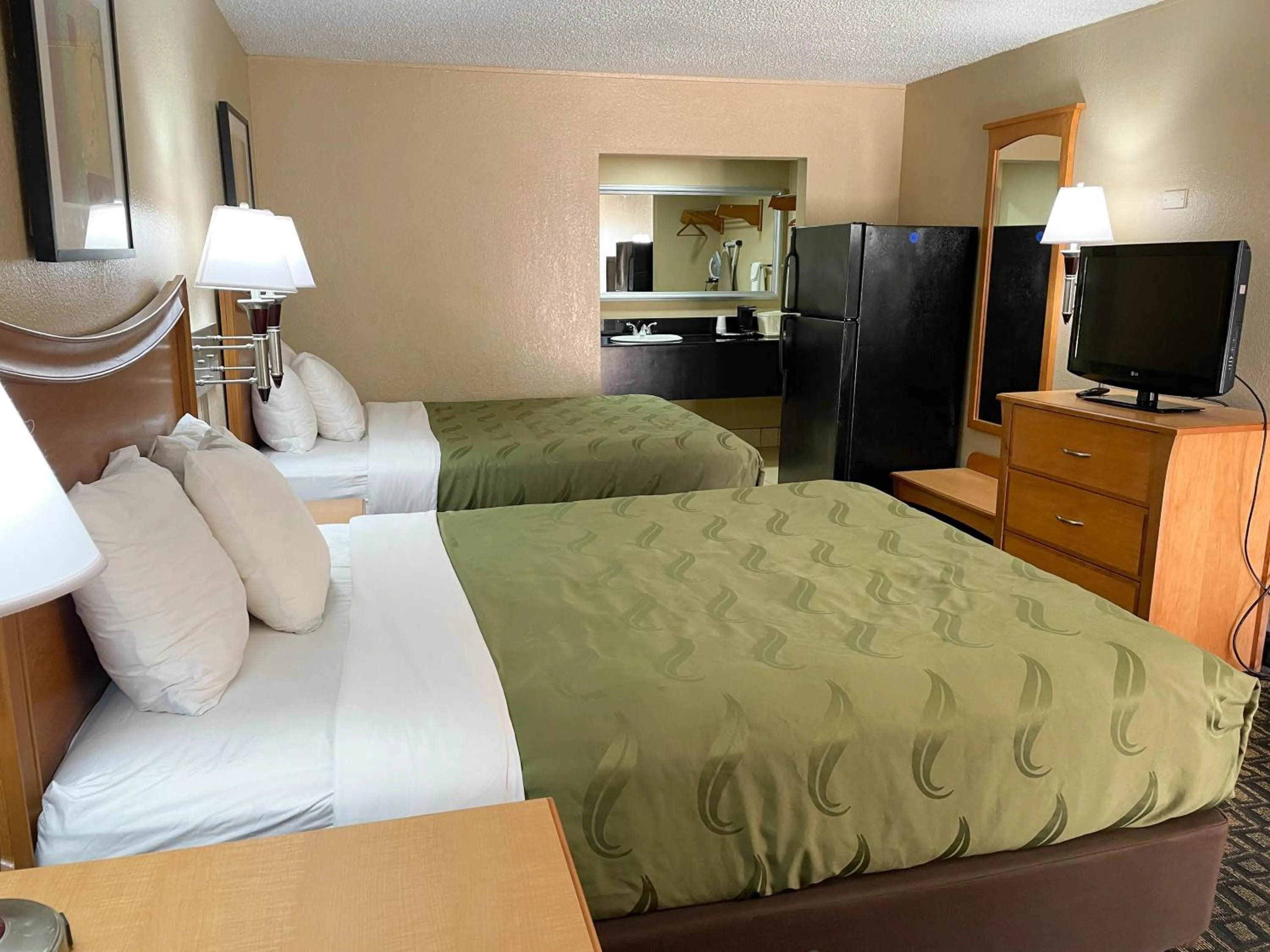 Bed in Studio 6 Suites North Richland Hills TX