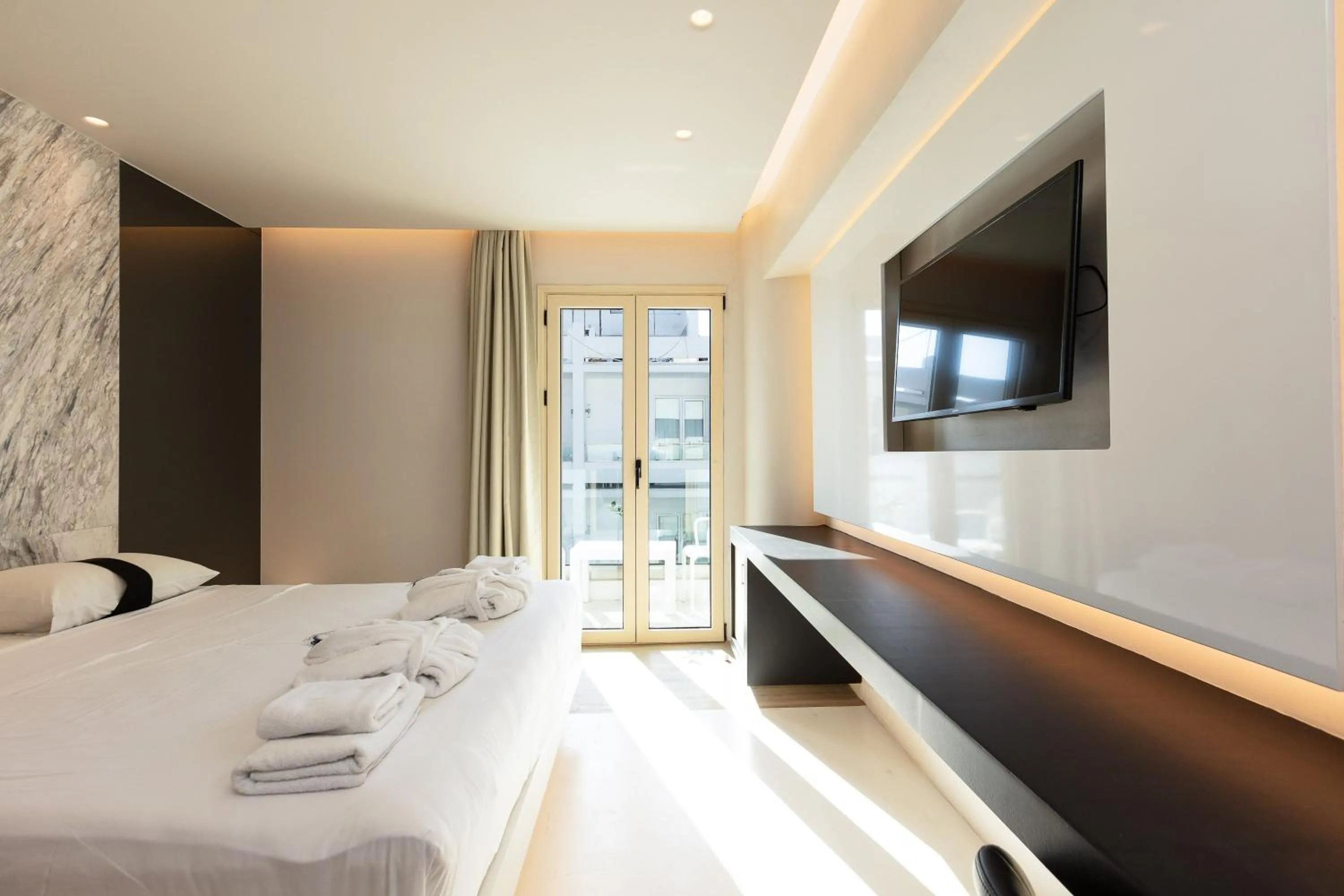 Photo of the whole room, Bed in Kahlua Boutique Hotel - Adults Only